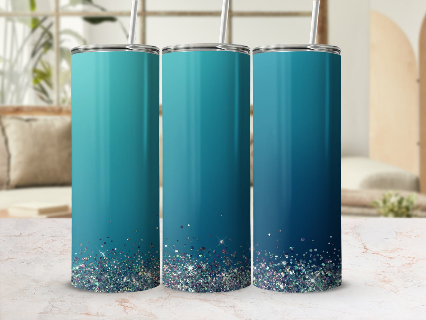 Three tumblers with a blue to teal gradient and a glitter bottom.