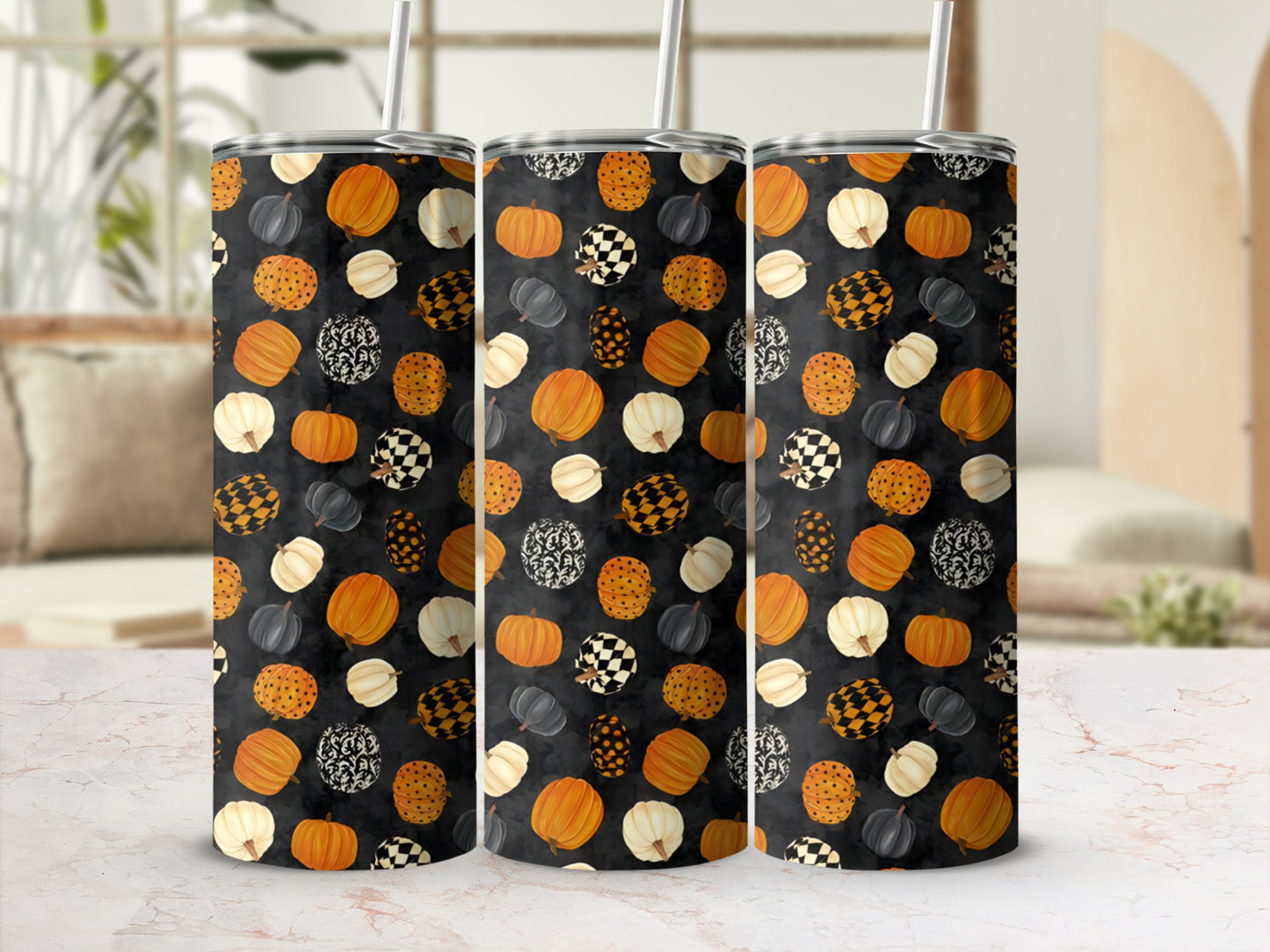 Three tumblers with a black background filled with pumpkins and checkerboard patterns.