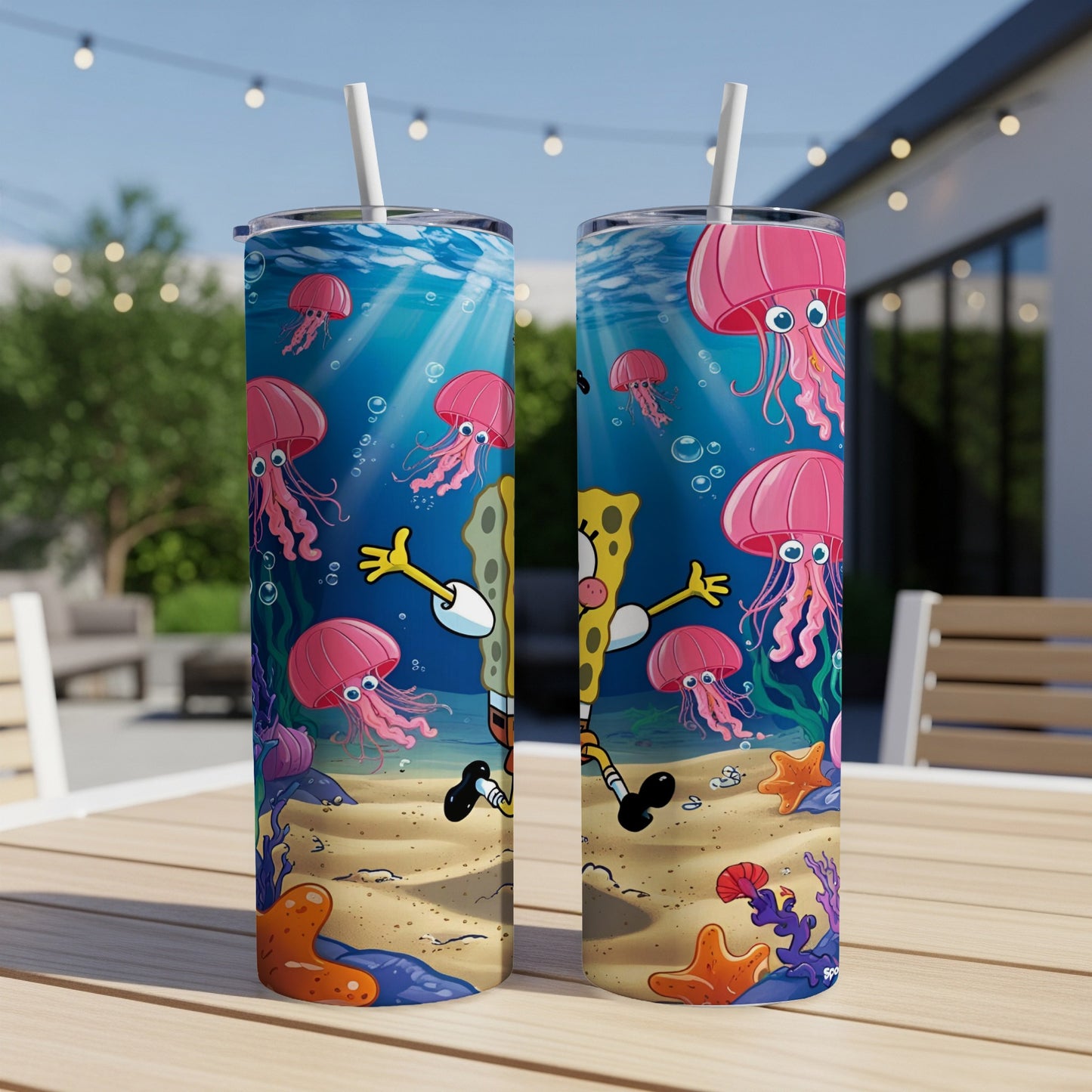 SpongeBob SquarePants with jellyfish and starfish on a sandy ocean floor.