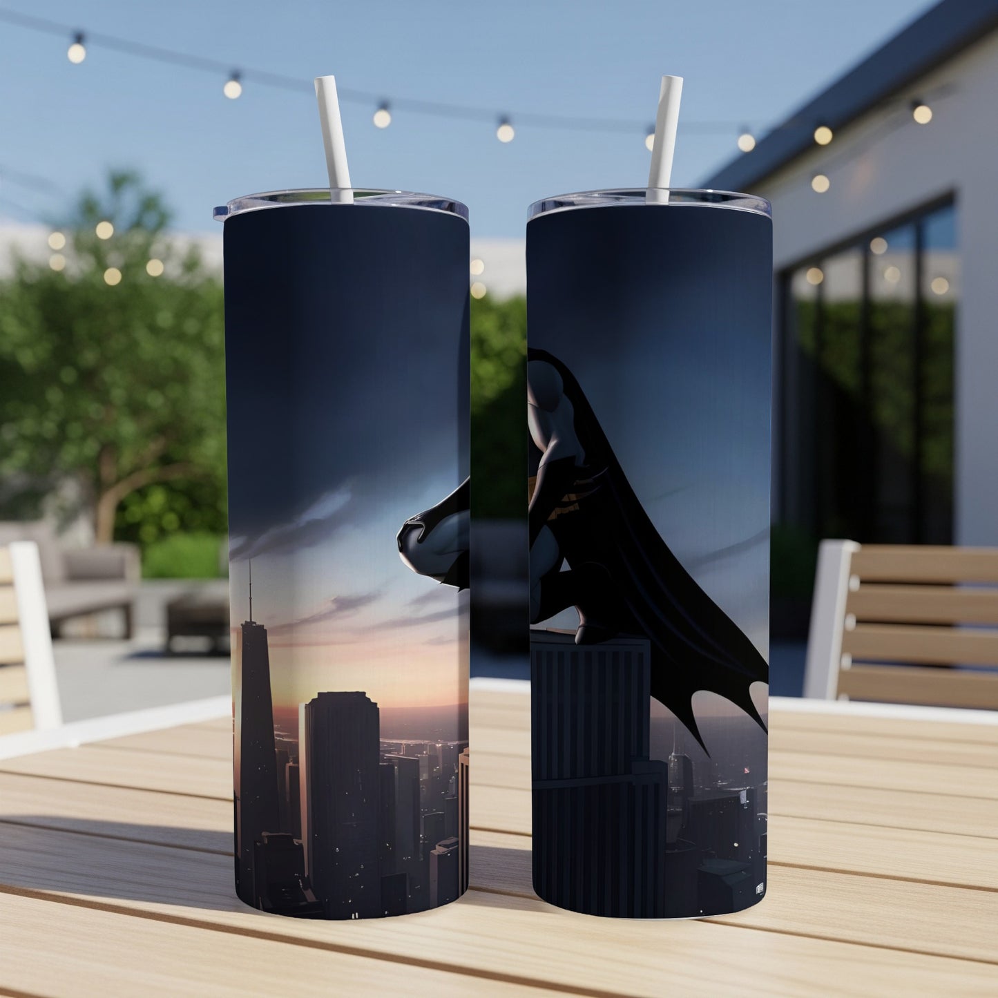 Batman silhouette overlooking city at sunset on two tumblers.