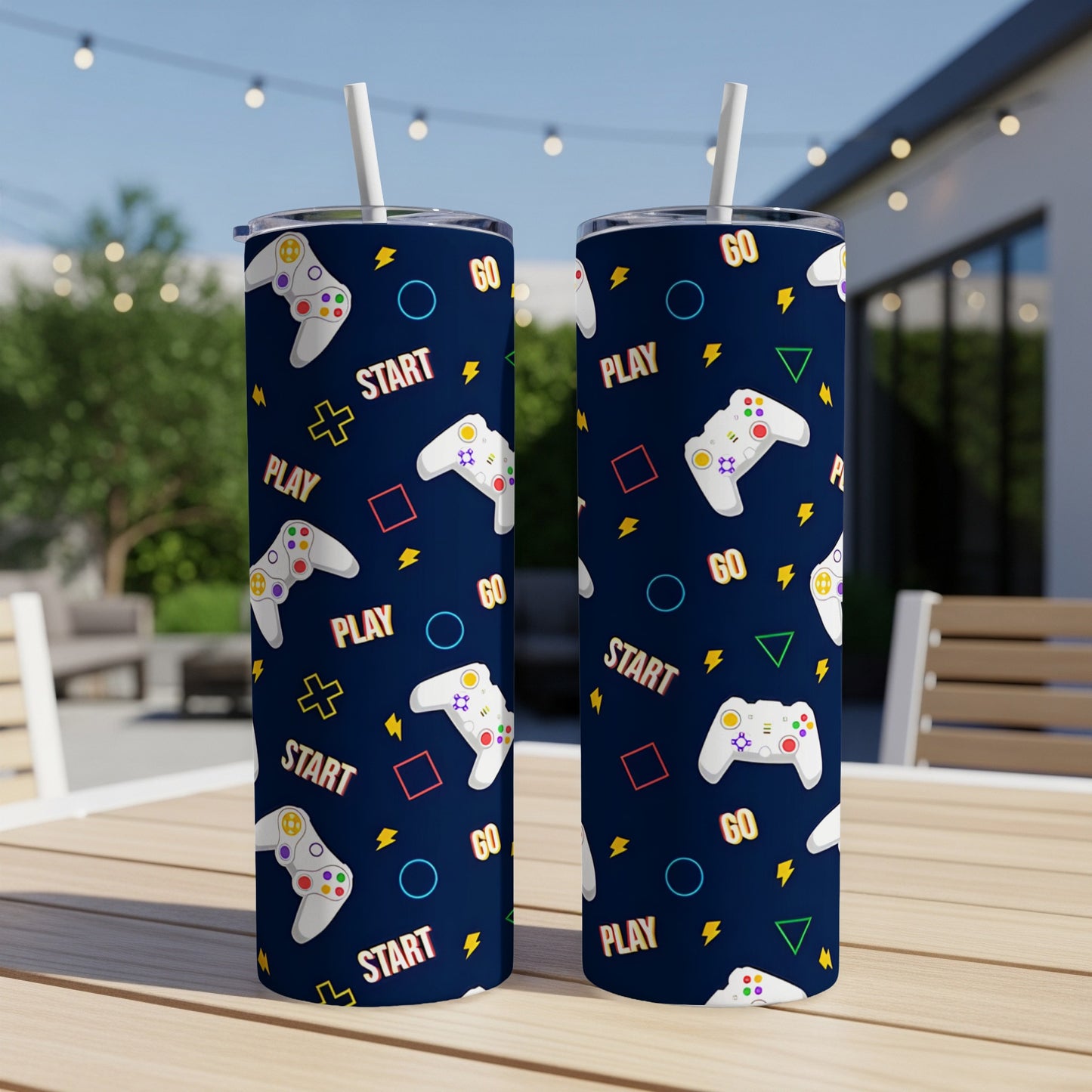 Two tumblers with a dark blue background and video game controller and button pattern.