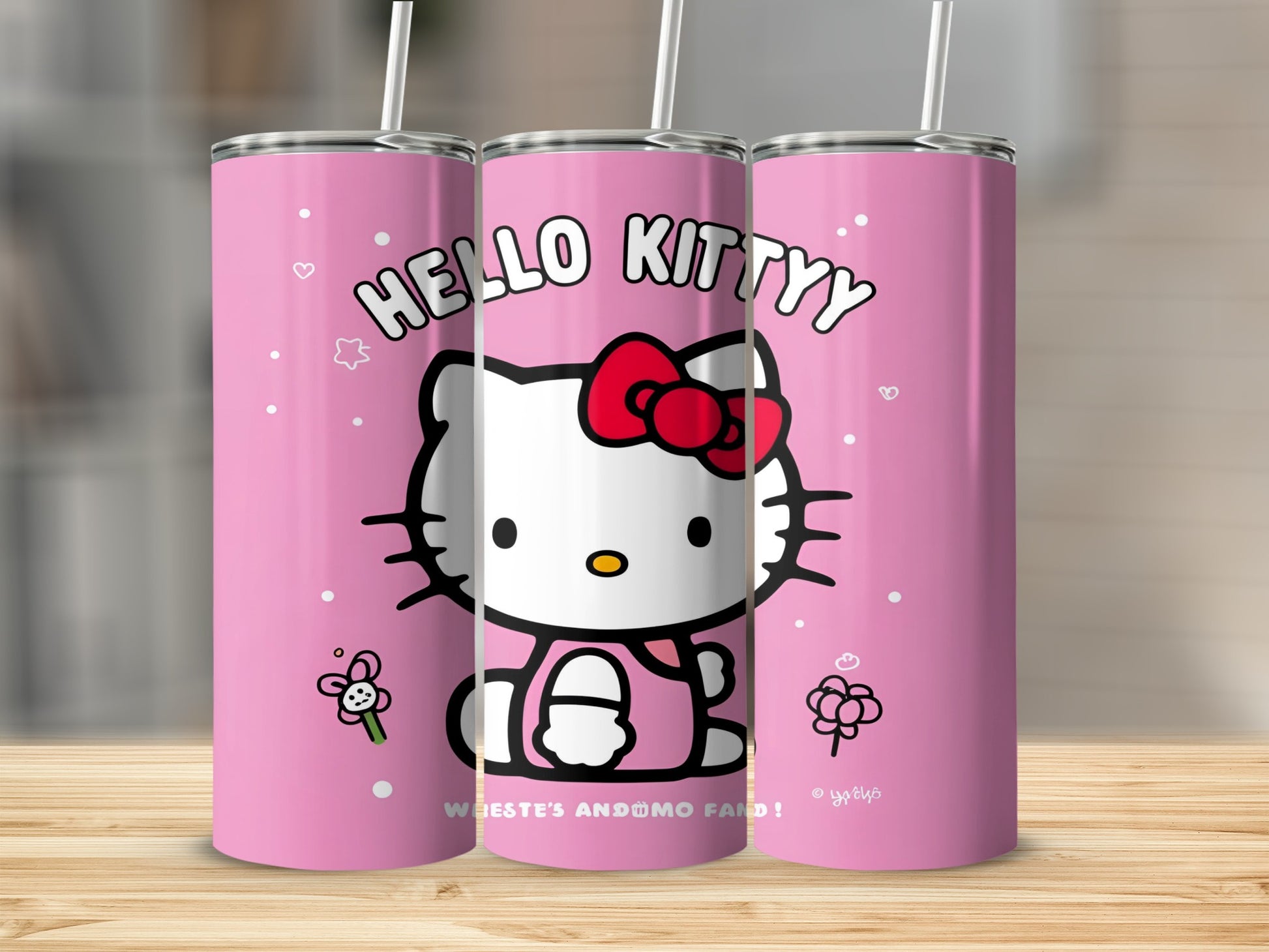 Hello Kitty tumbler with pink background and floral accents.