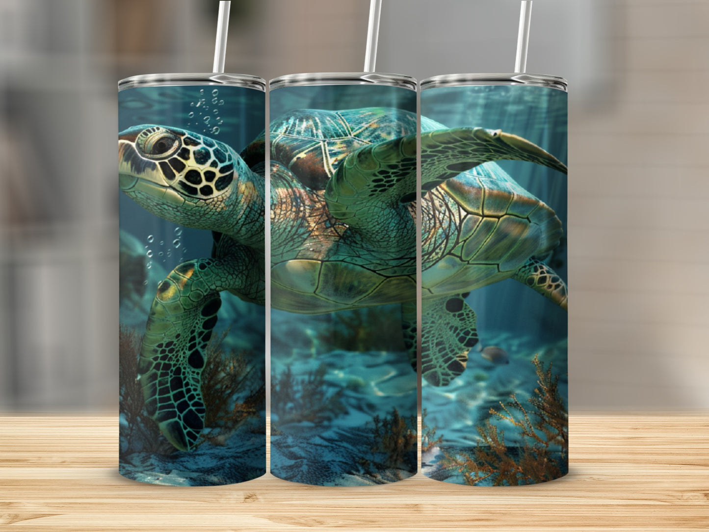 Three tumblers featuring a sea turtle swimming underwater with coral.