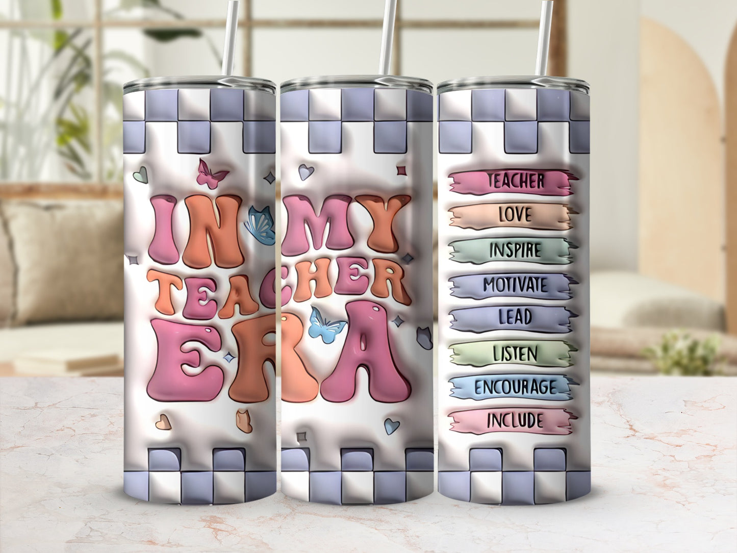 Pink "In My Teacher Era" tumbler with butterflies and inspirational words on checkerboard background.