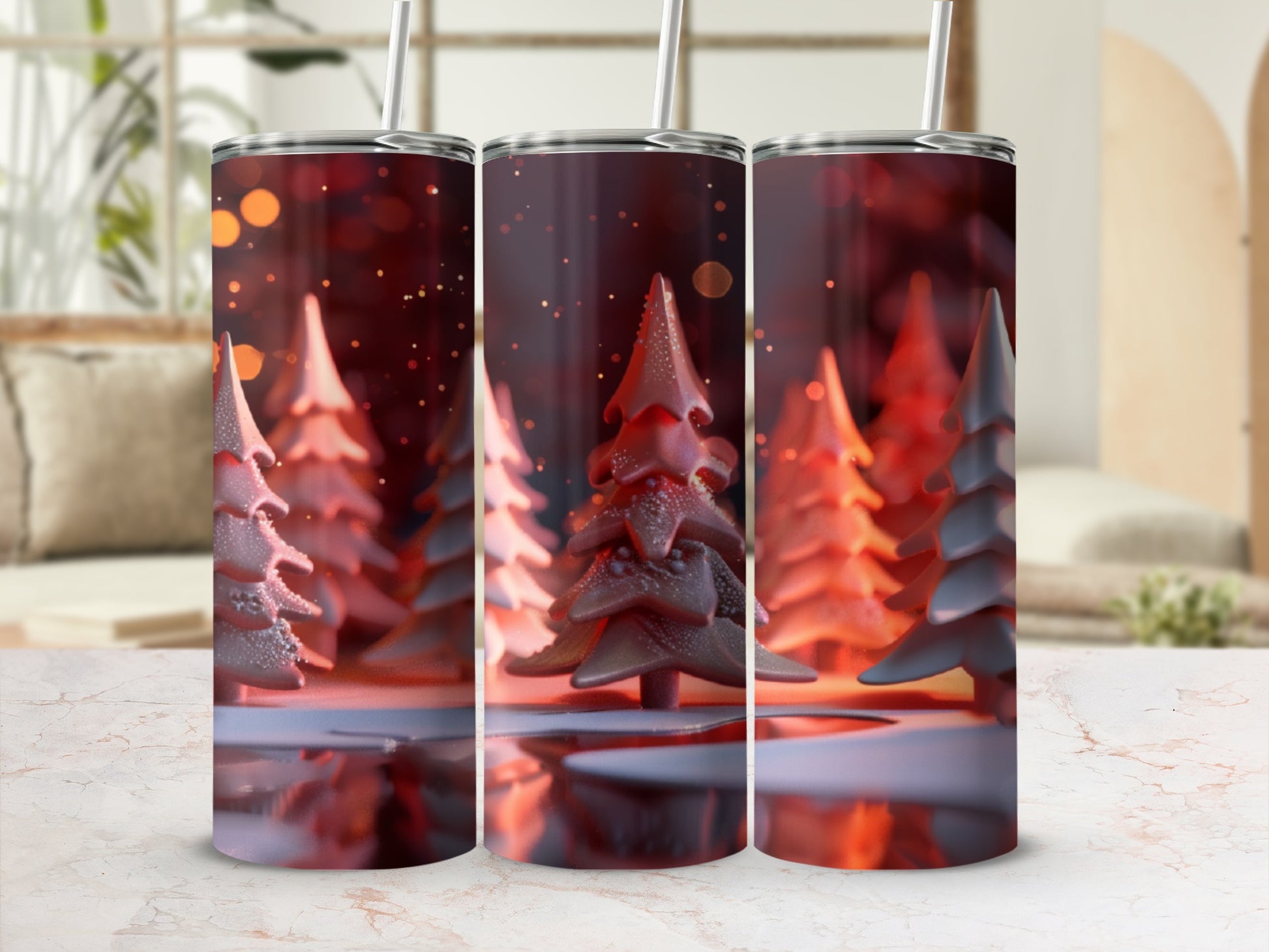 Three tumblers with a festive Christmas tree design and bokeh lights.