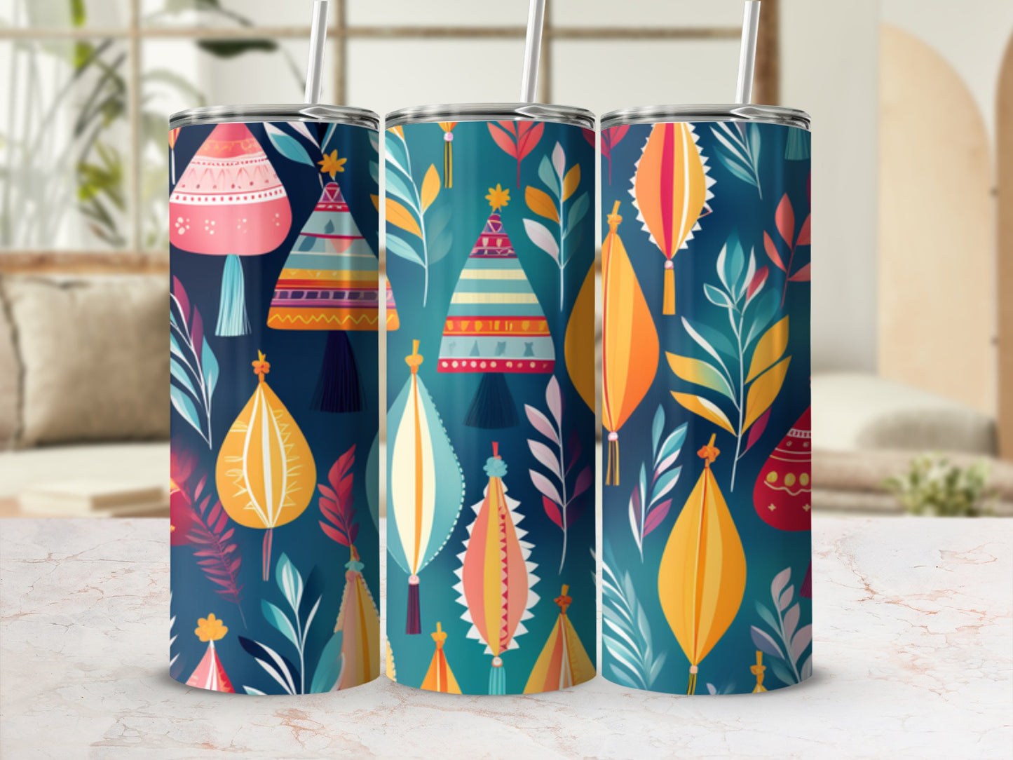 Three tumblers with boho-style lanterns and foliage in navy and teal.