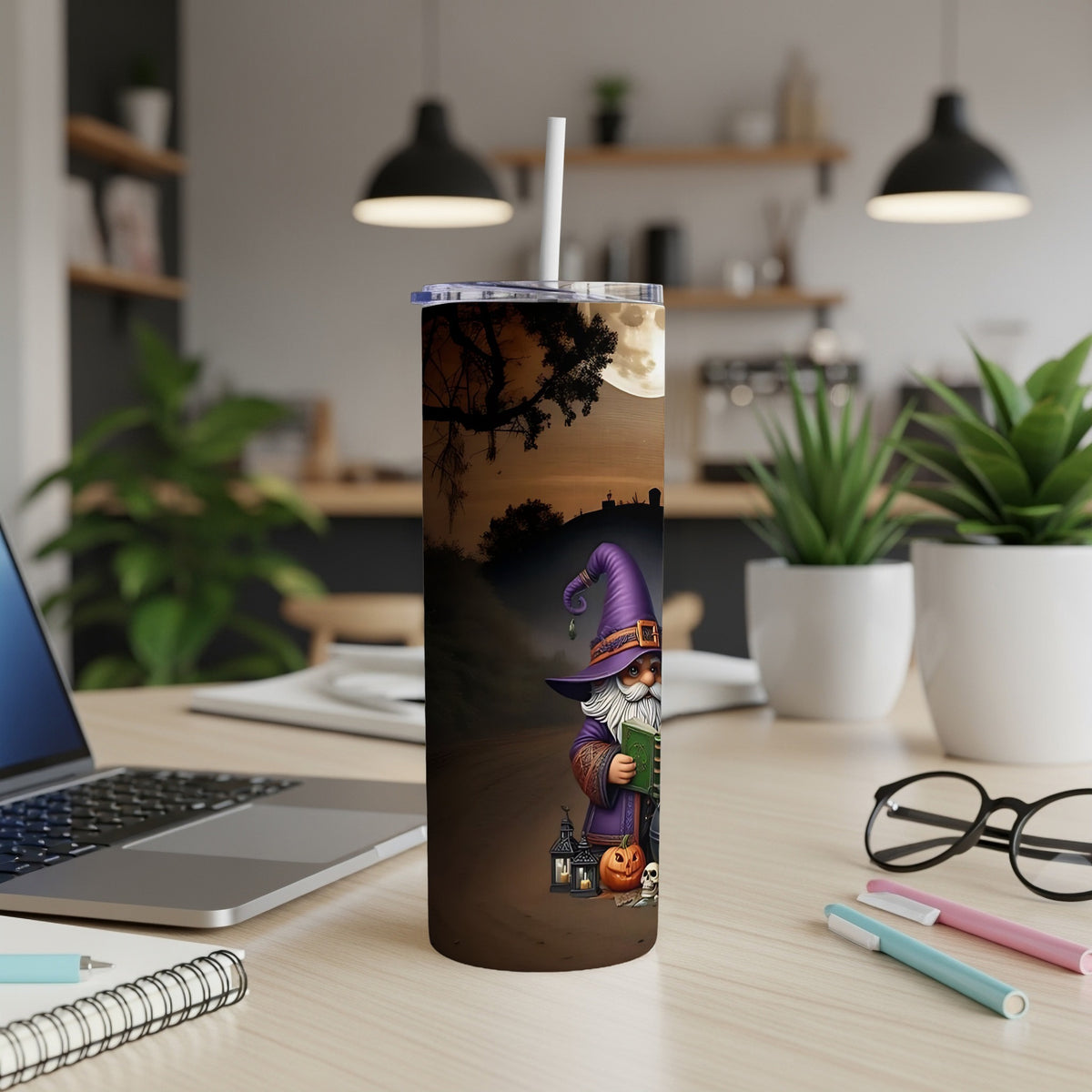 Halloween tumbler with wizard, pumpkins, skulls, and a moonlit graveyard scene.