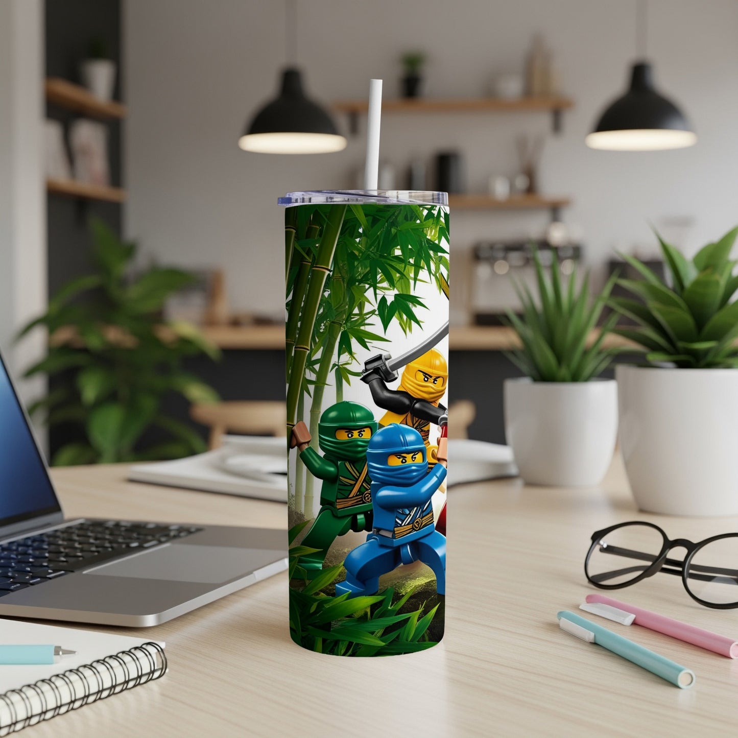 Ninjago characters in a bamboo forest on a tumbler with a white straw.