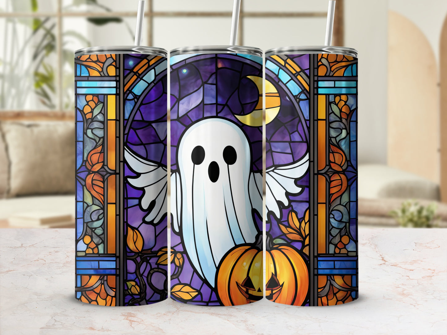 Three tumblers with a Halloween stained glass design featuring a ghost and pumpkin.