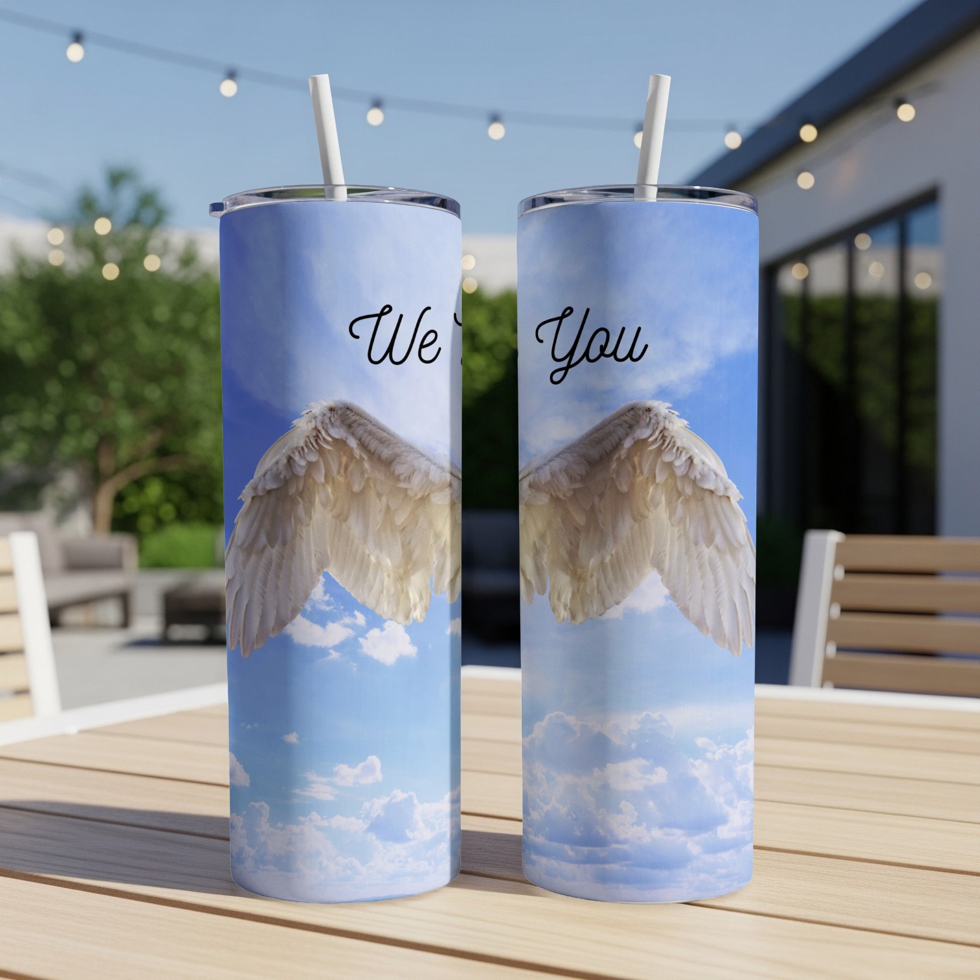 Two tumblers with angel wings and "We You" text against a sky background.