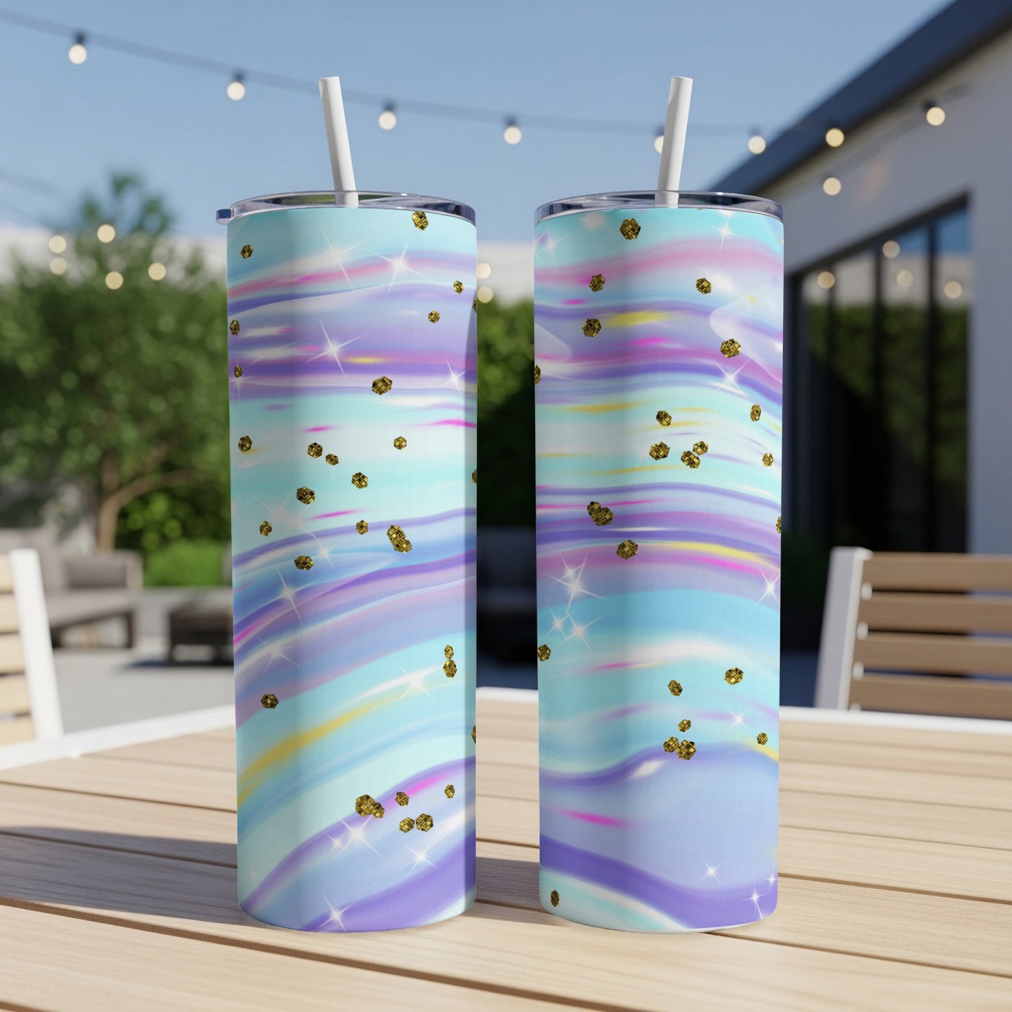 Two tumblers with a colorful pastel swirl pattern and gold glitter accents.