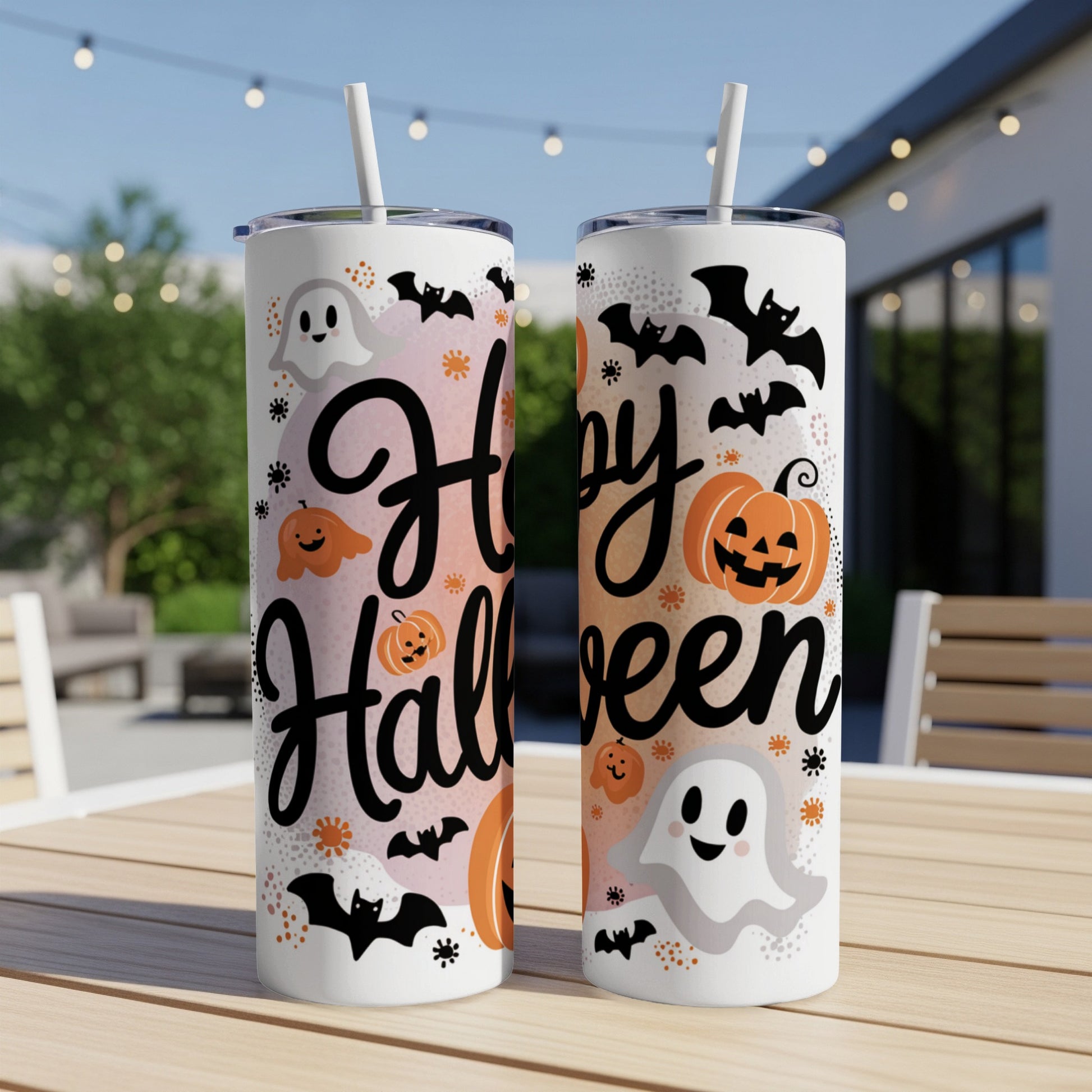 Two skinny tumblers with "Happy Halloween" text, ghosts, pumpkins, and bats.