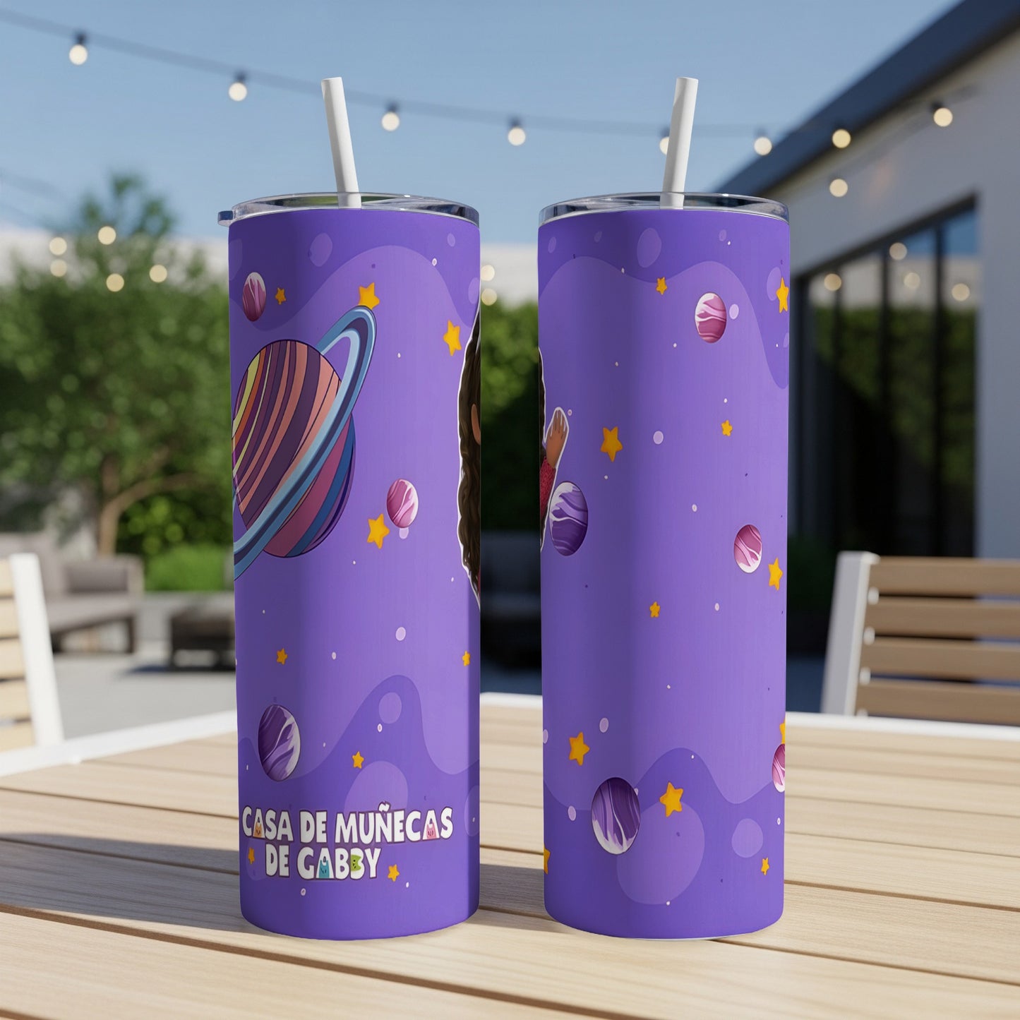 Purple tumbler with planets and stars, "CASA DE MUÑECAS DE GABBY" text.
