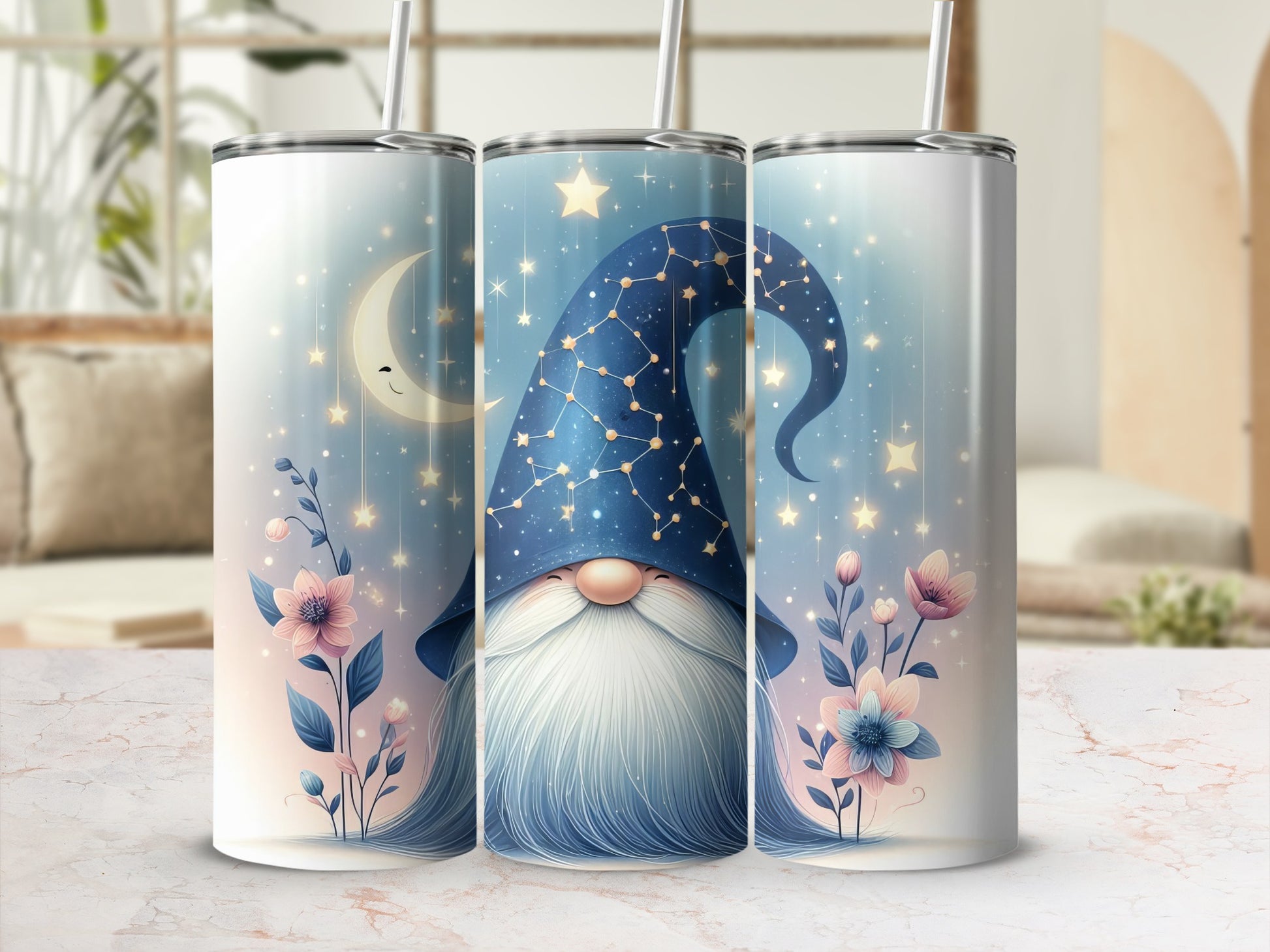 Three tumblers with a blue gnome, moon, stars, and floral design.
