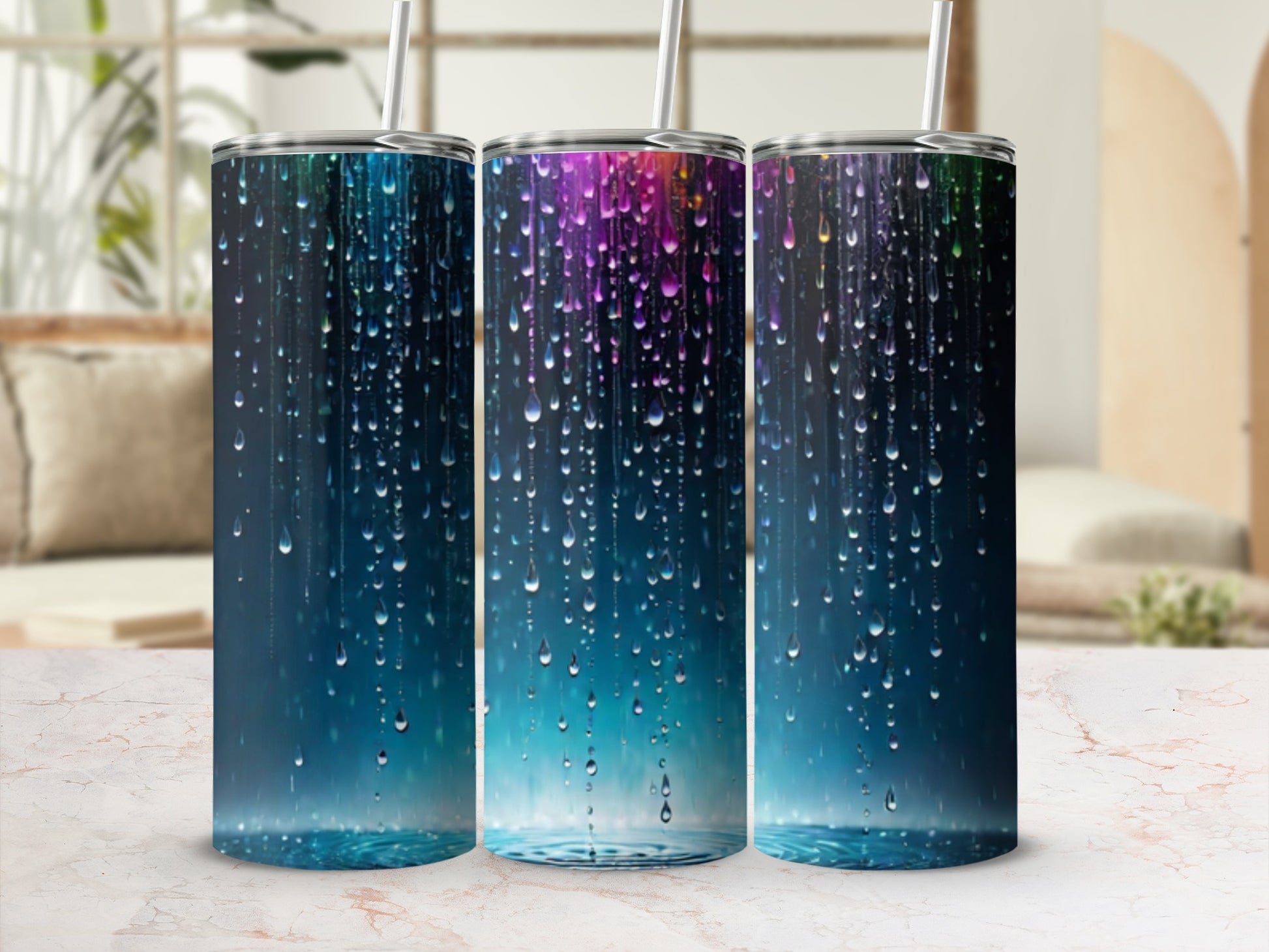 Three colorful tumblers with falling water droplets design.