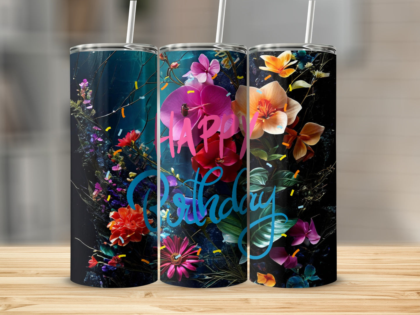Floral tumbler with "Happy Birthday" text on a wooden surface.