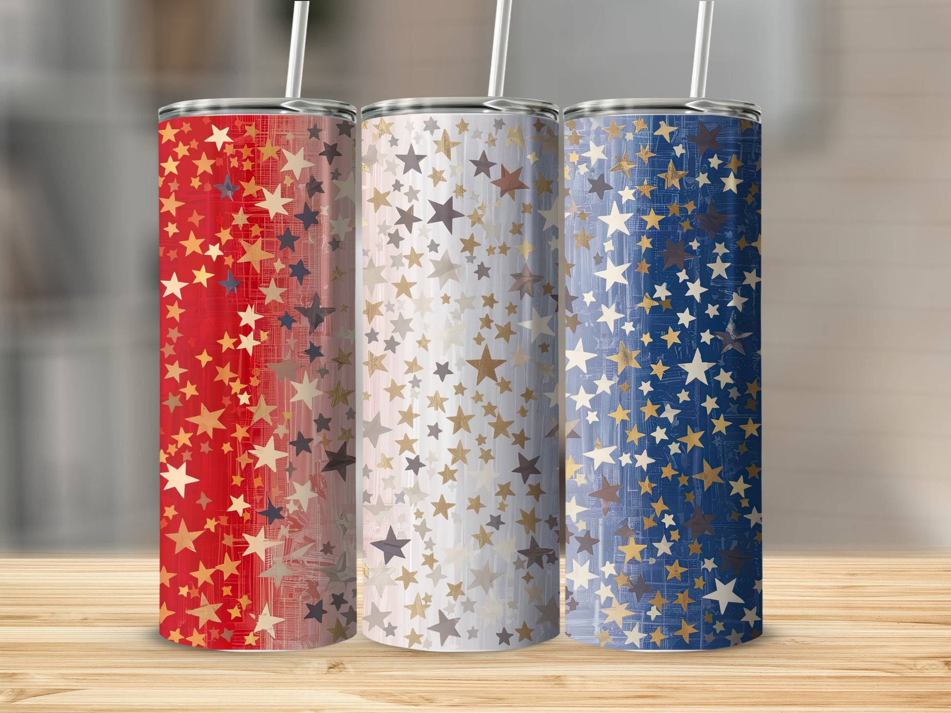 Three tumblers with patriotic star patterns in red, white, and blue.