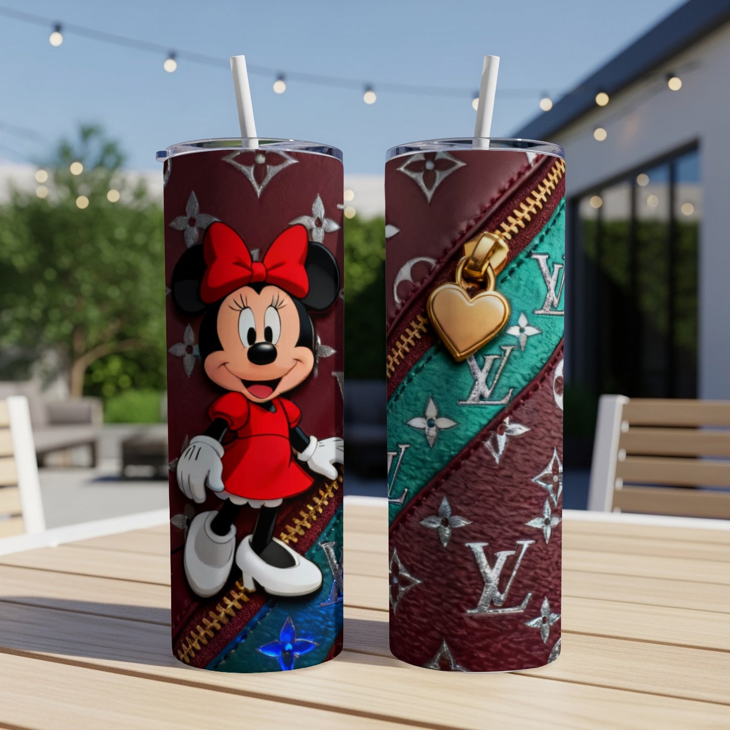 Minnie Mouse on patterned tumbler with golden heart zipper charm.