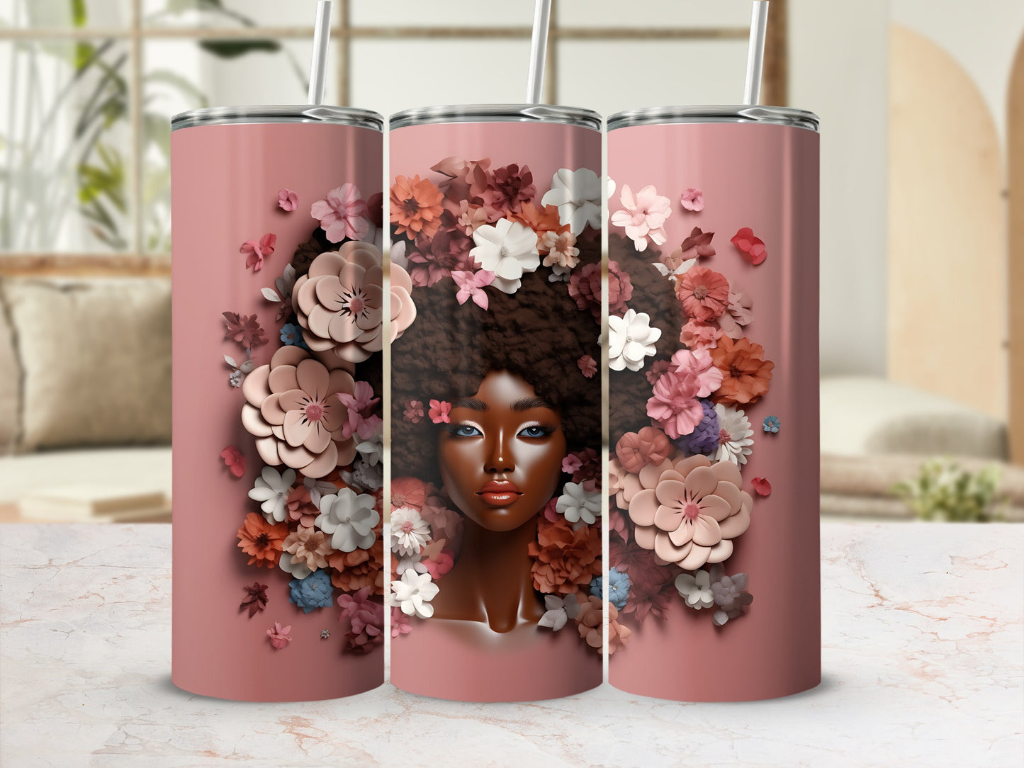 Pink tumbler with a woman's portrait surrounded by floral elements.