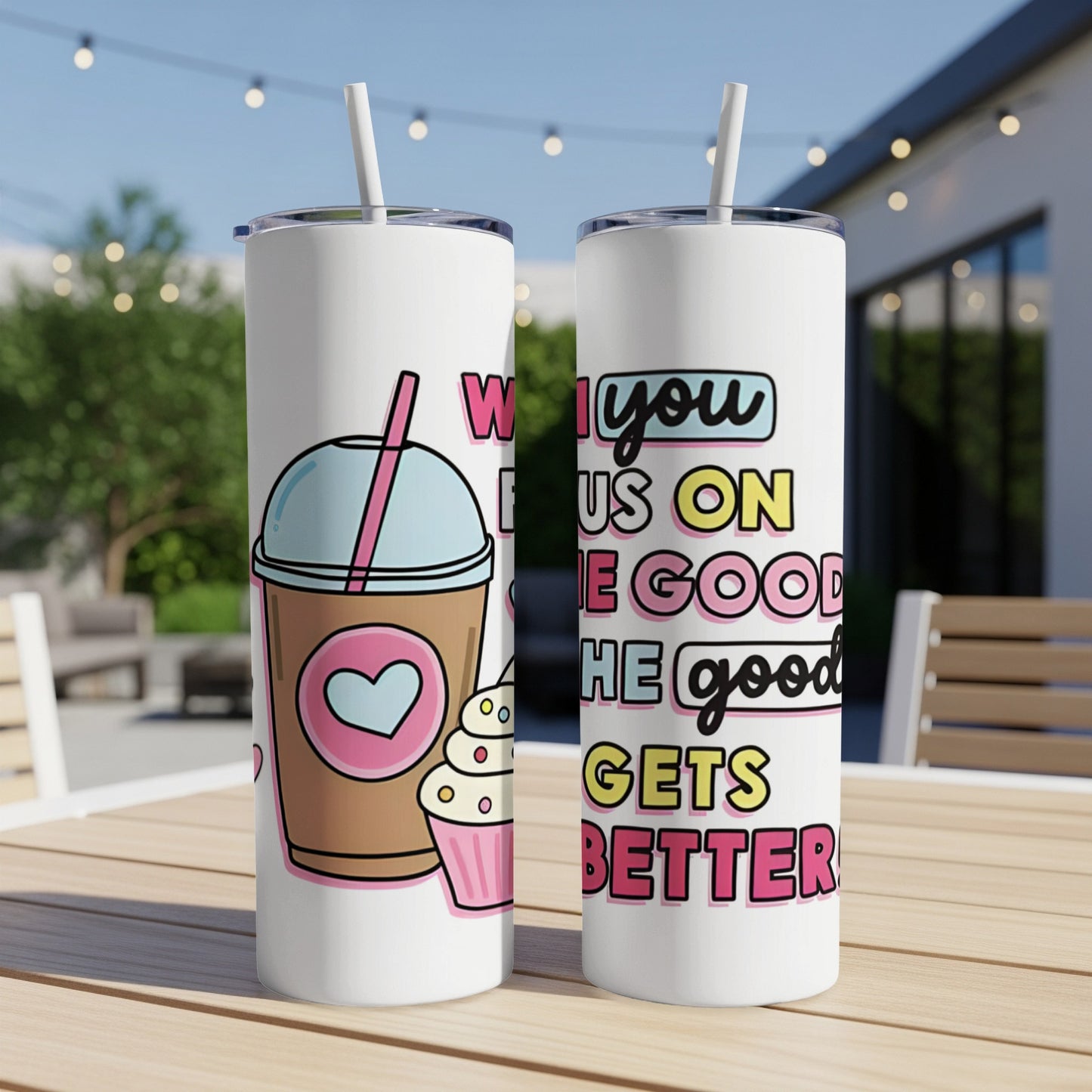 Tumbler with pink hearts, cupcake, and motivational text.