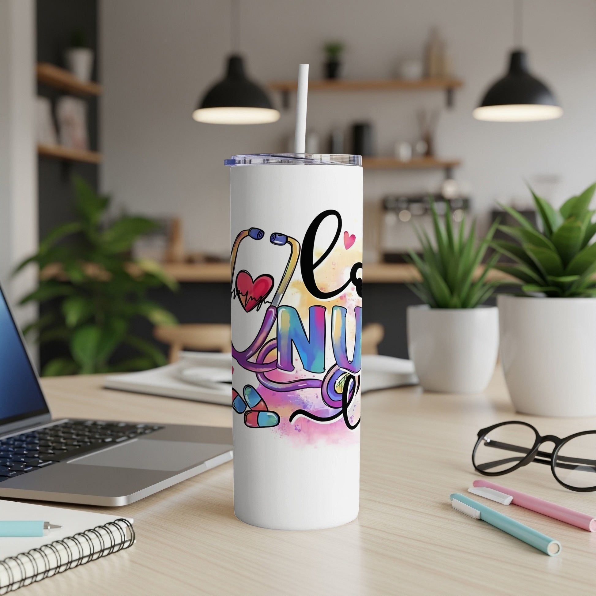 White tumbler with "Nurse" in colorful letters and medical symbols.