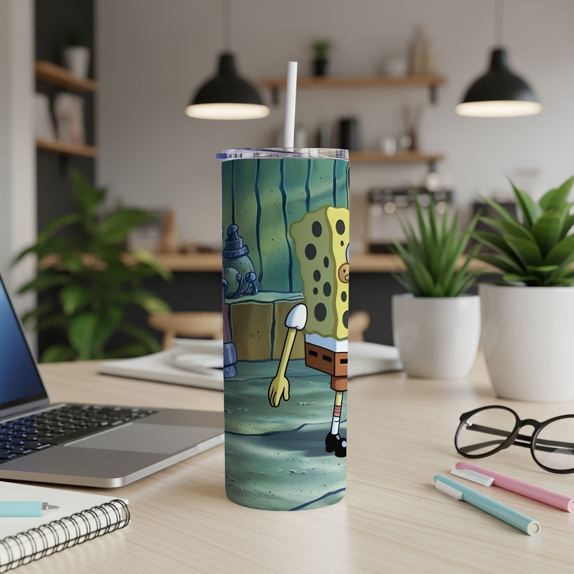 SpongeBob SquarePants character on a tumbler, with a kitchen counter background.