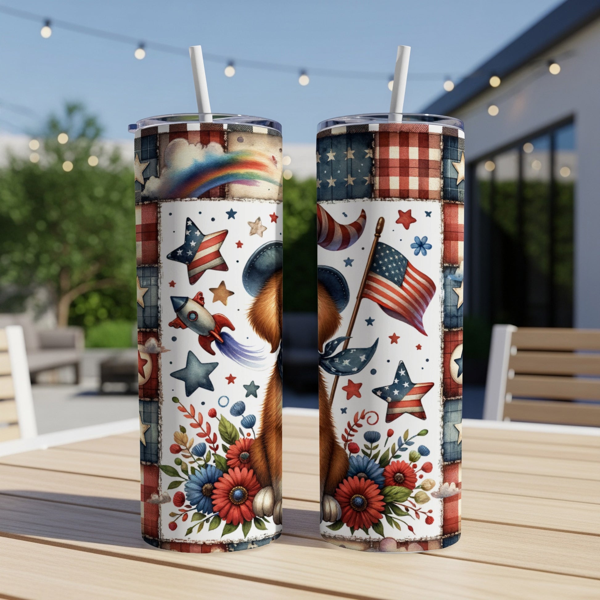 Red, white, and blue patriotic tumbler with stars, rocket, and flowers.