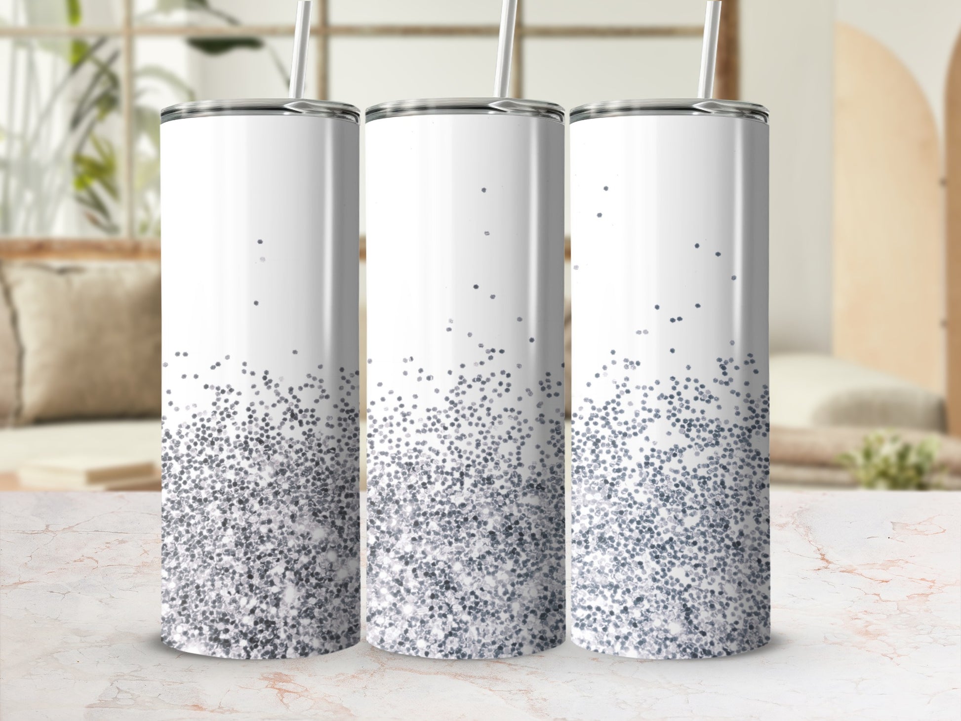 Three white tumblers with sparkling silver glitter design.