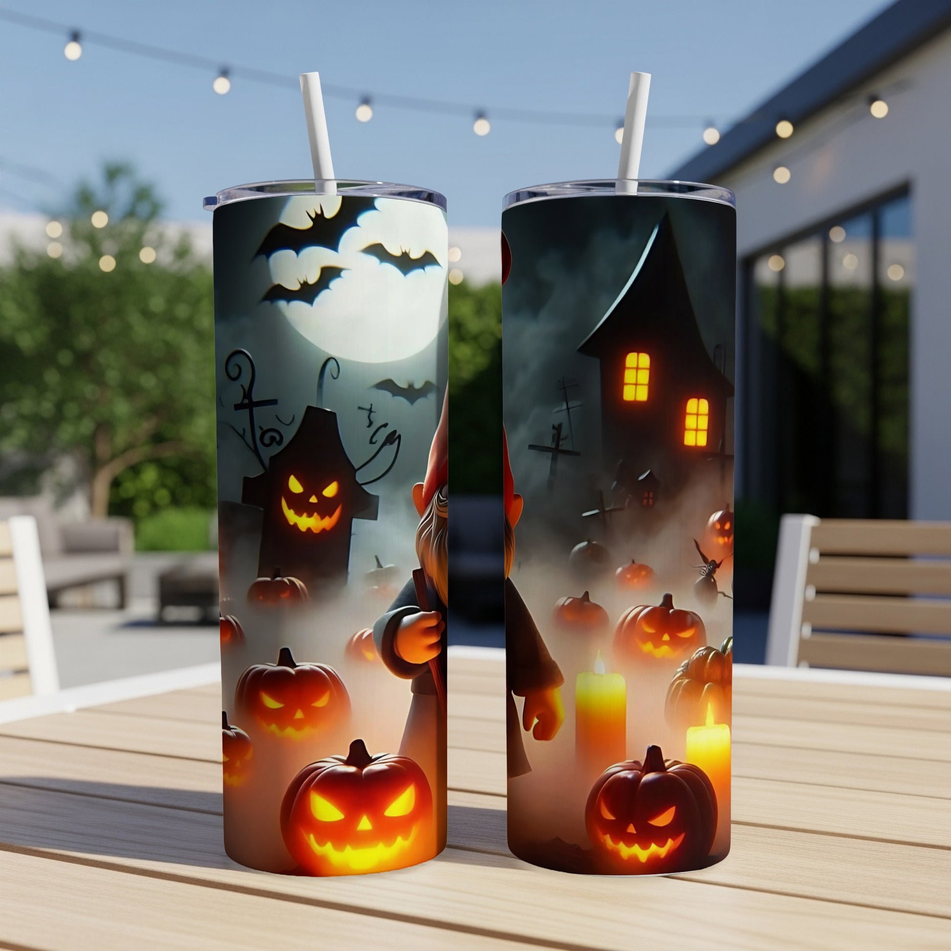 Halloween tumbler with pumpkins, bats, spooky house, and a gnome design.
