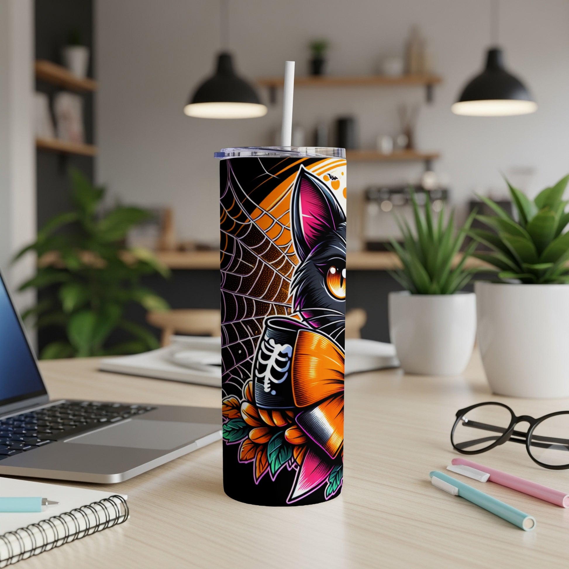 Halloween tumbler featuring a black cat, spiderweb, skeleton, and pumpkin design.