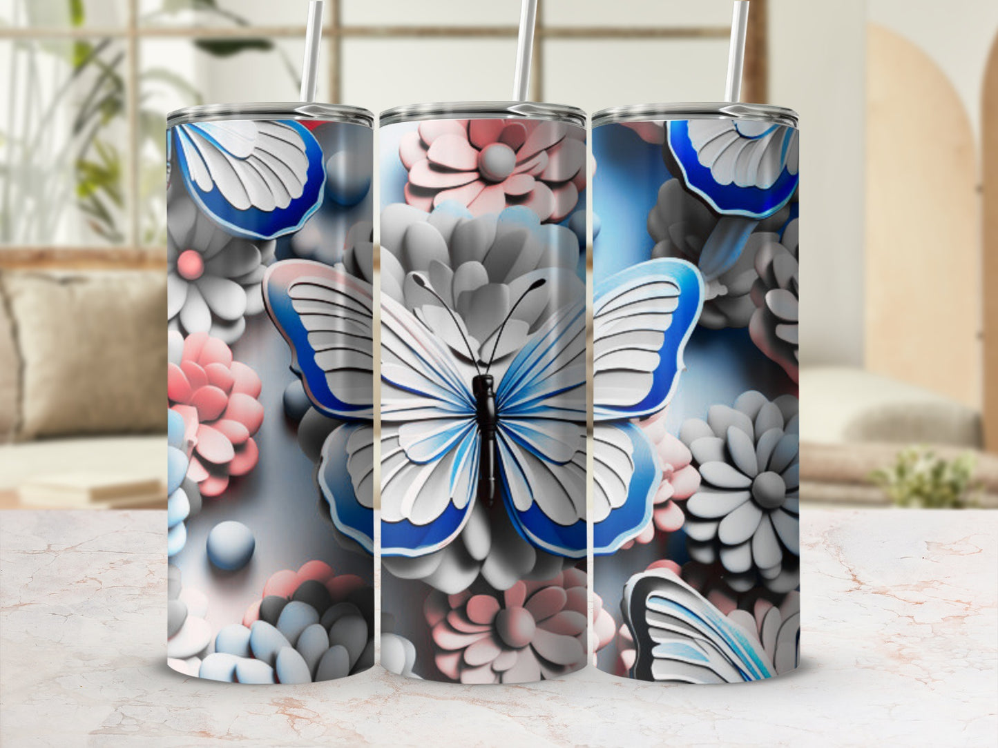 Three tumblers with a blue and white butterfly and floral design.