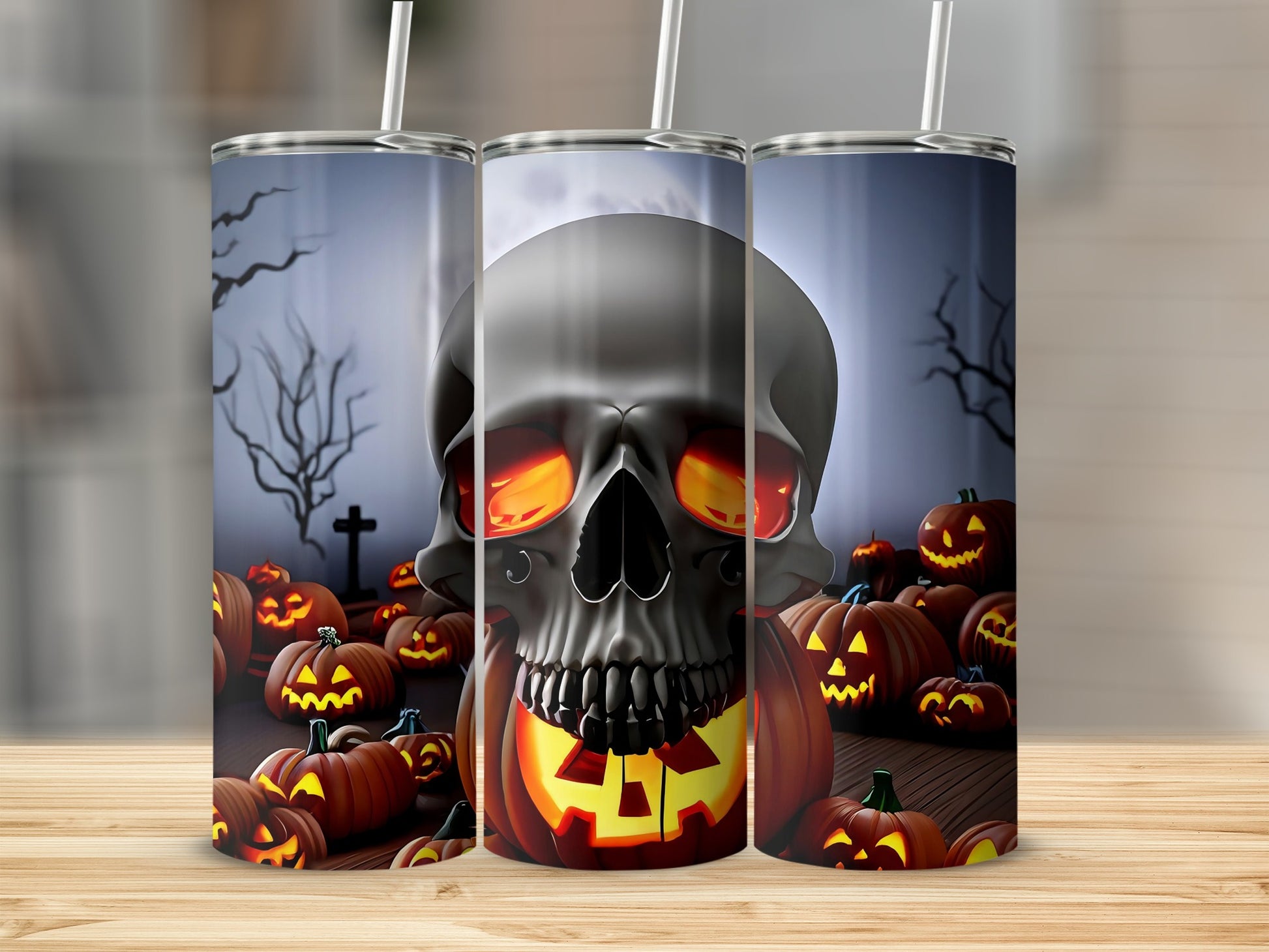 Halloween tumblers with a skull and glowing jack-o'-lanterns design.