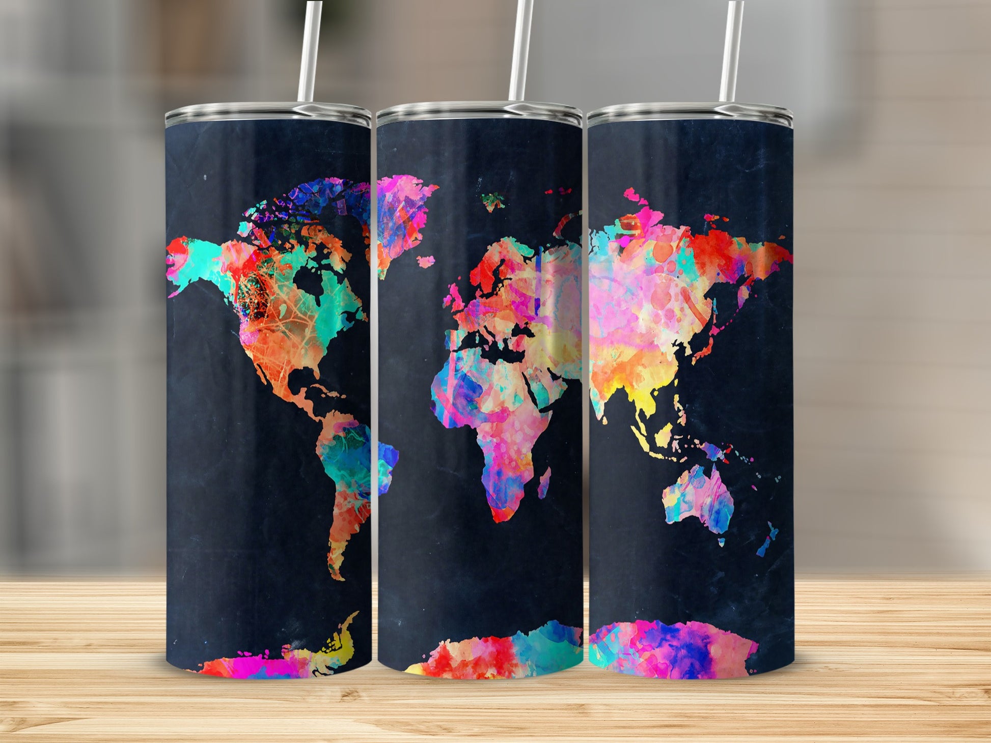 Three tumblers feature a colorful, abstract world map design on a dark background.
