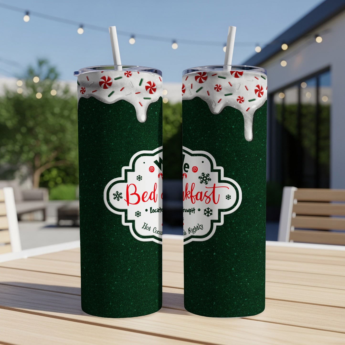 Green glitter tumbler with "Bed & Breakfast" text and holiday-themed illustrations.