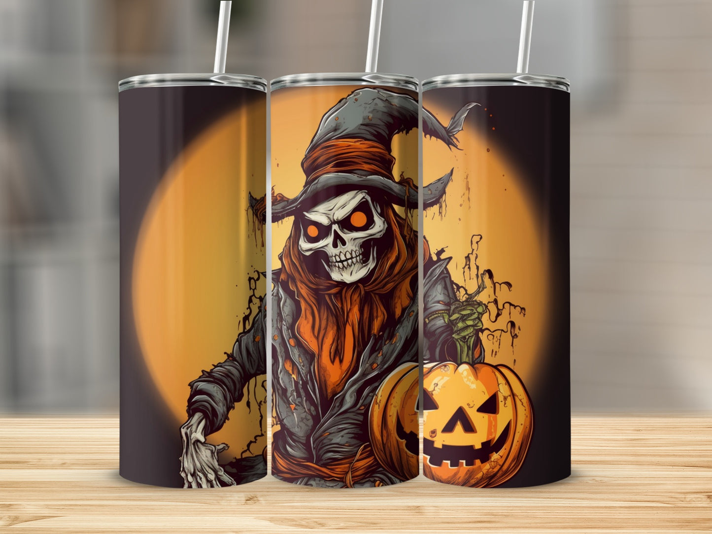 Three tumblers with Halloween reaper and pumpkin artwork on orange background.
