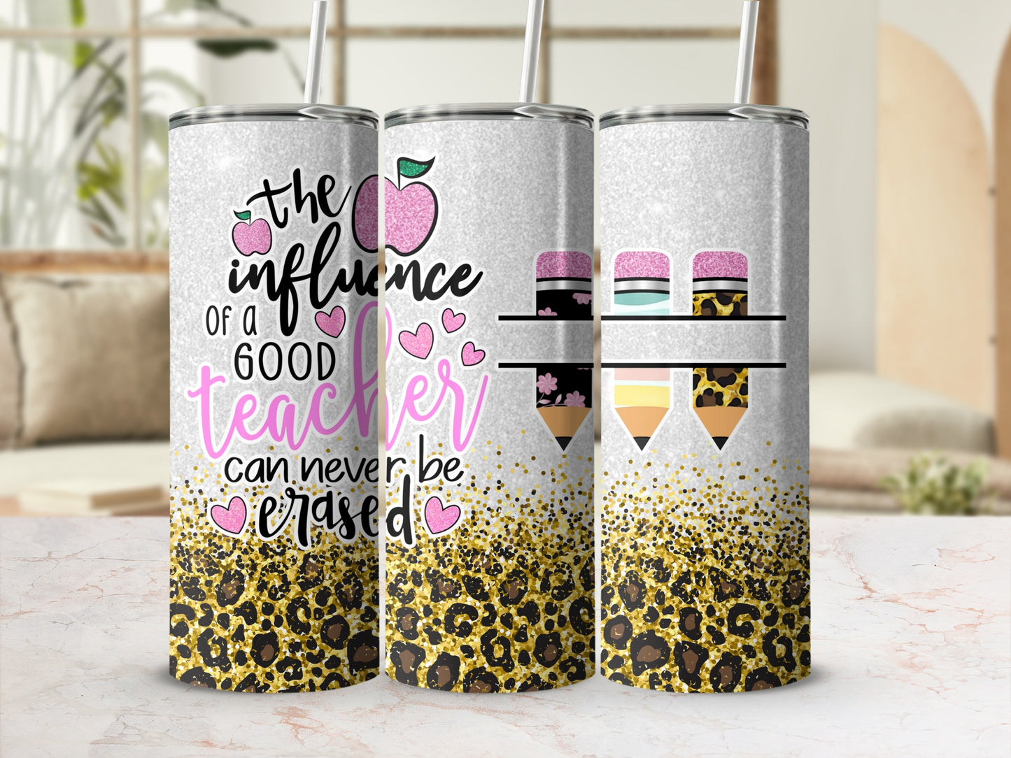 Tumbler with "The influence of a good teacher can never be erased" and apple design.
