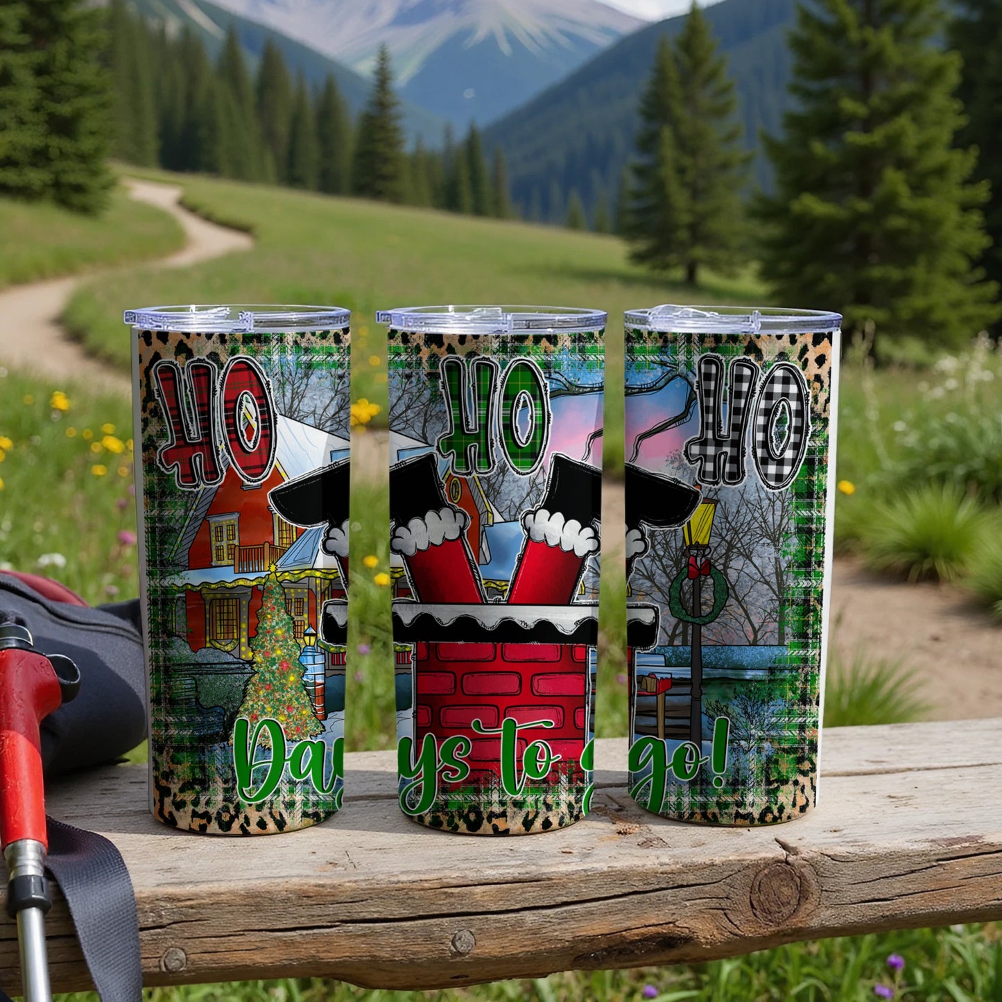 Three tumblers with "40 Days to Go!" text and holiday designs on a wooden surface.