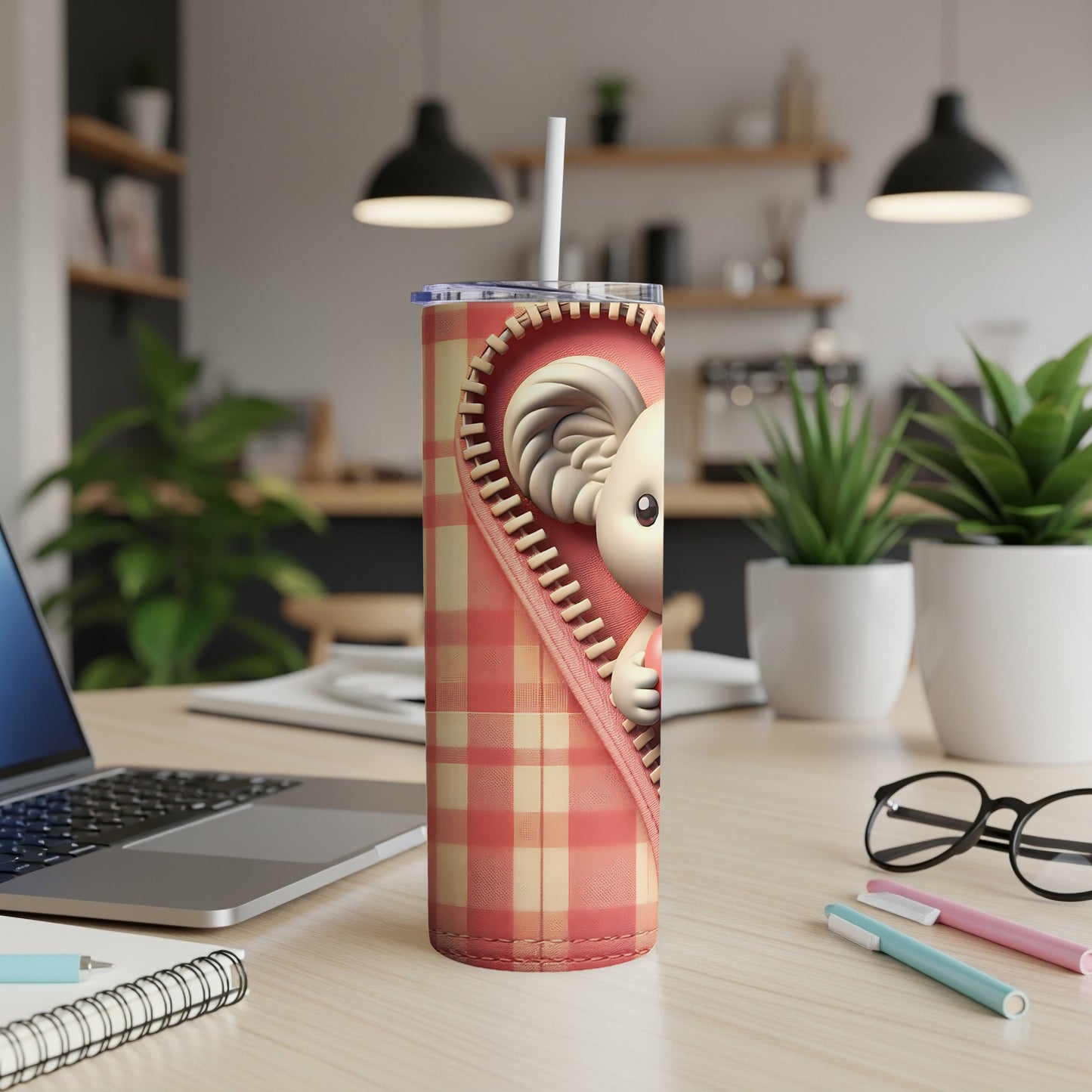 Cute cartoon koala peeking from a plaid zipper on a tumbler.