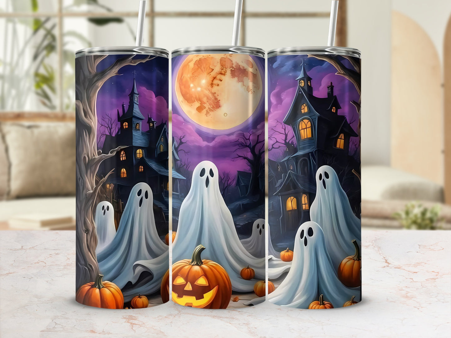 Halloween tumblers with ghosts, haunted houses, pumpkins, and a full moon.