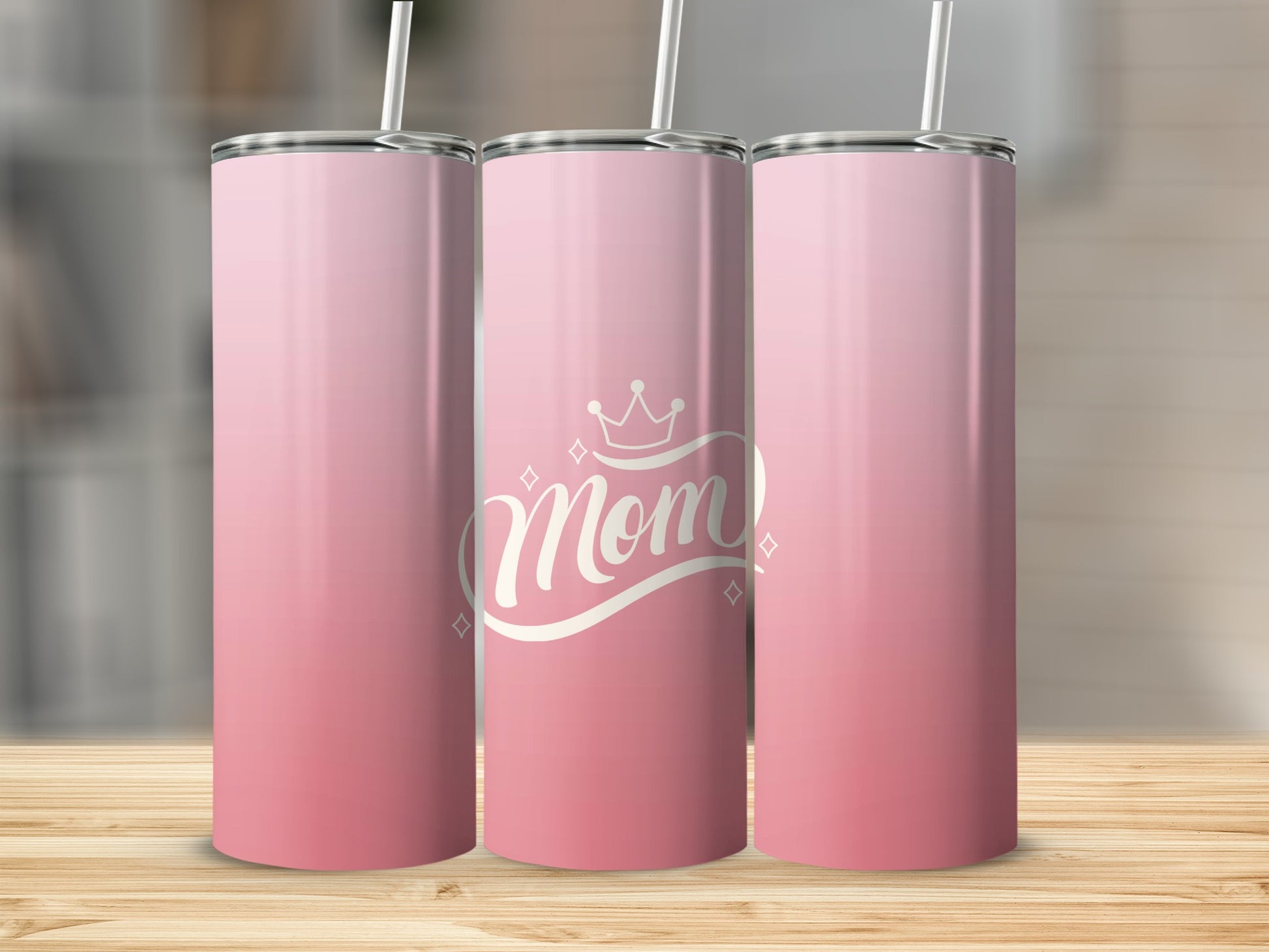 Pink ombre tumbler with "Mom" and crown design.