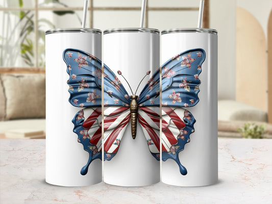 White tumbler with a patriotic butterfly design featuring stars and stripes.