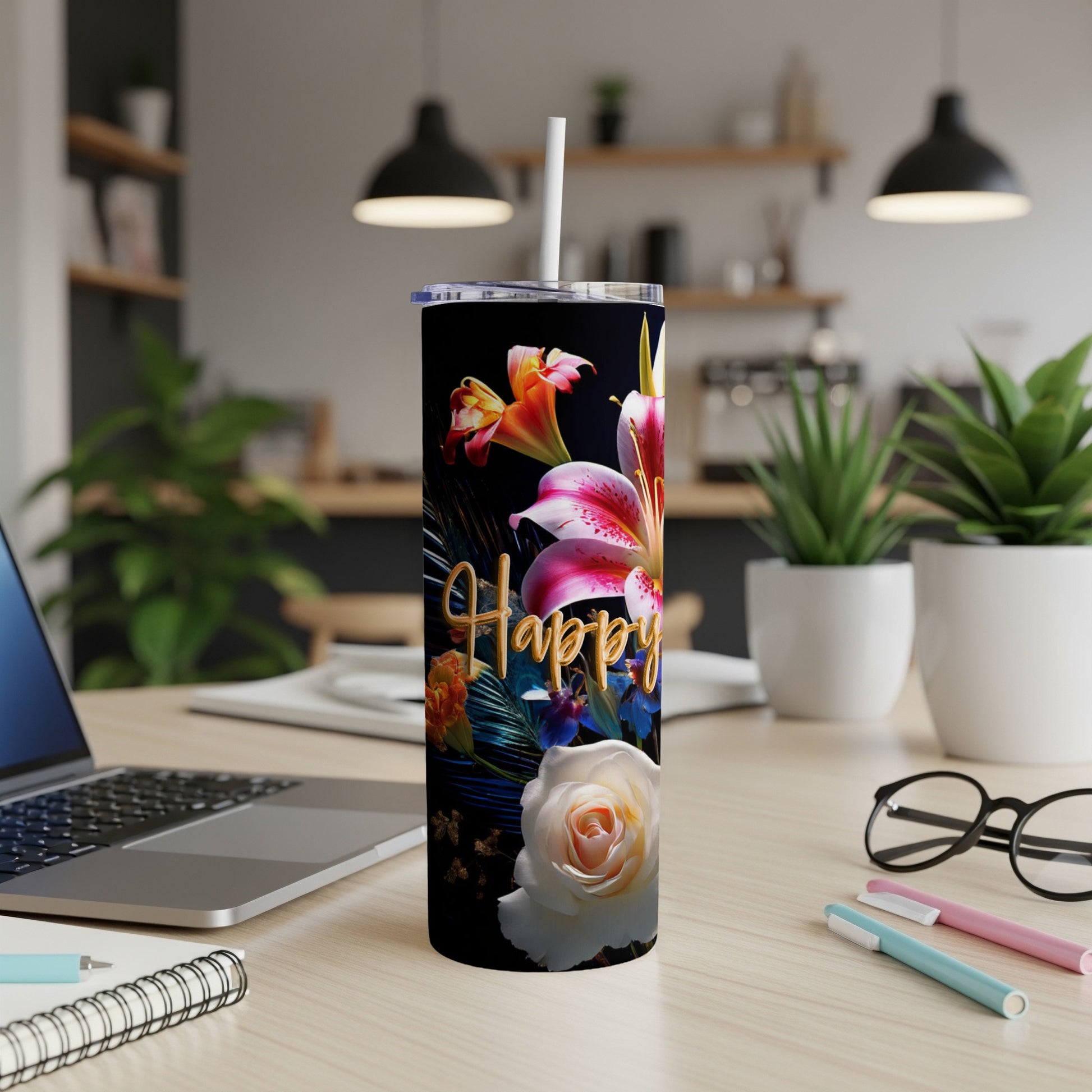 Black tumbler with "Happy" in gold script and floral accents.