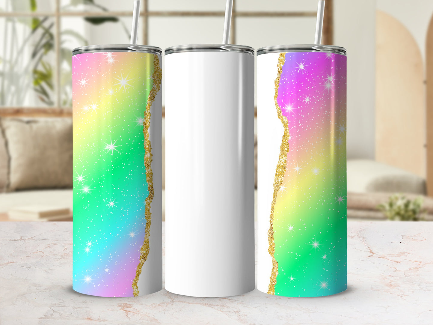 Three skinny tumblers with rainbow gradient and gold glitter accents.