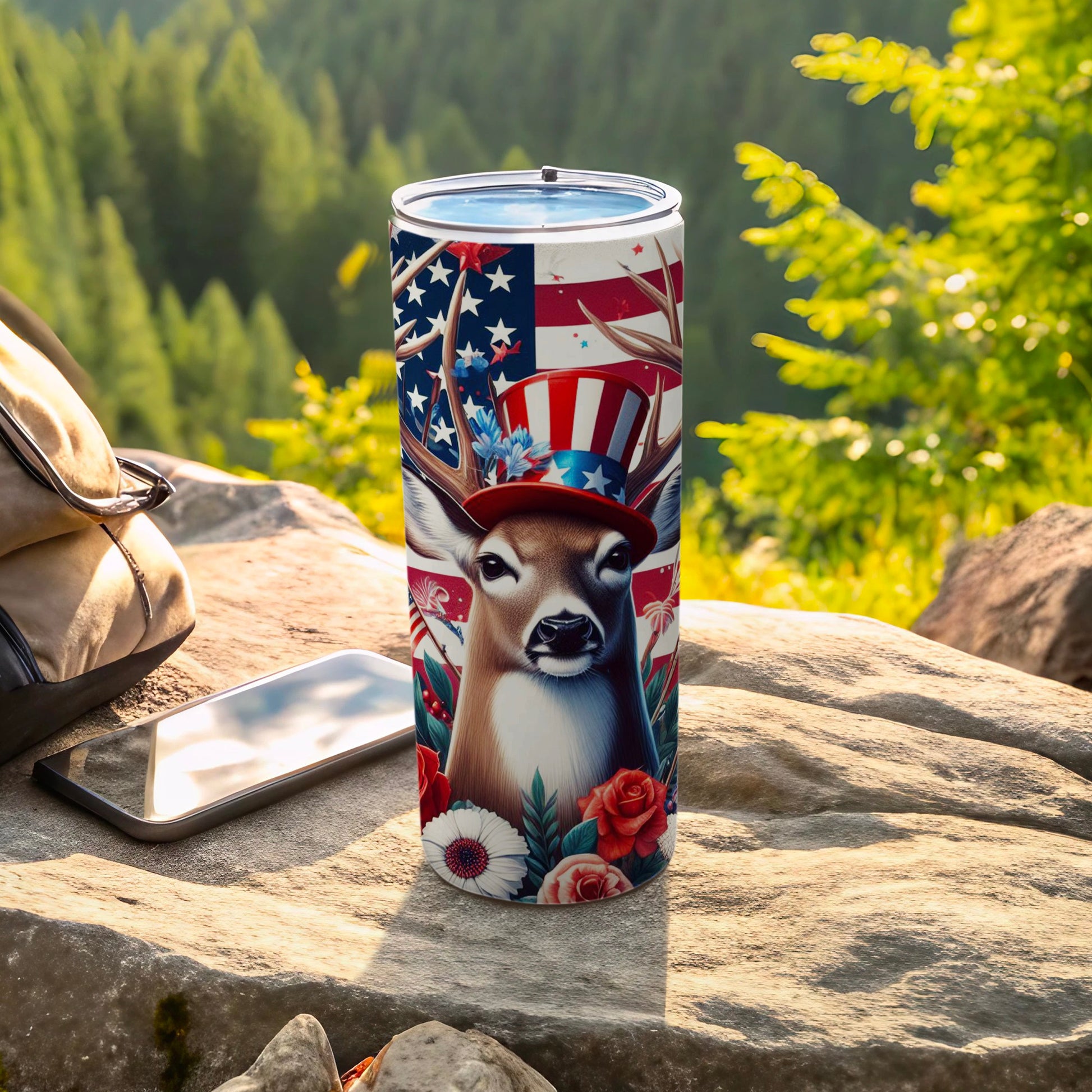 Deer in patriotic hat with American flag and flowers on tumbler.