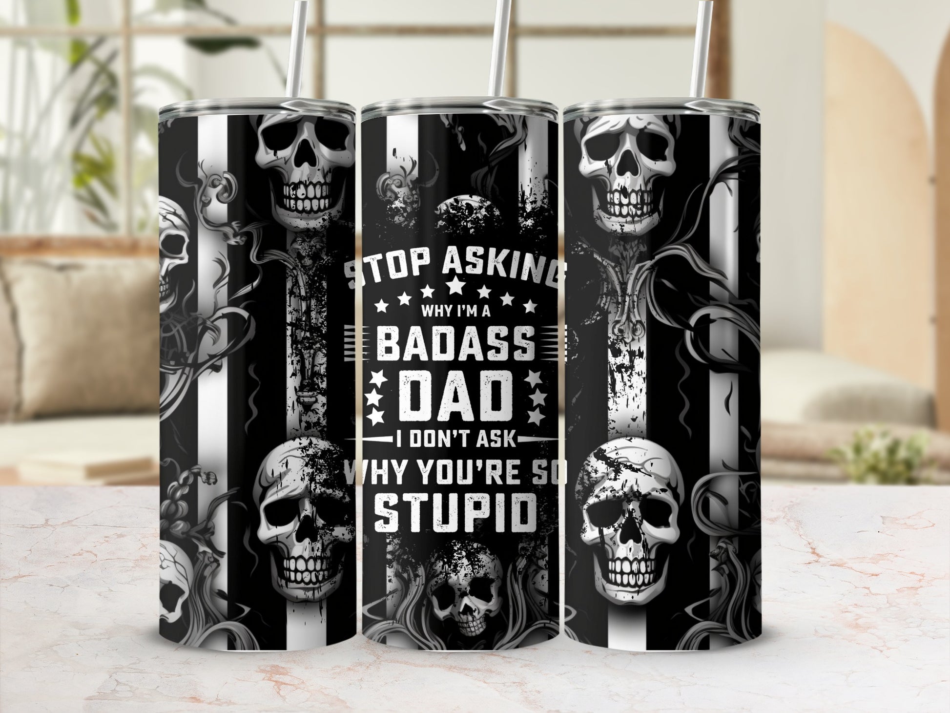 Black and white tumbler with skulls and text "Stop asking why I'm a badass dad I don't ask why you're so stupid."