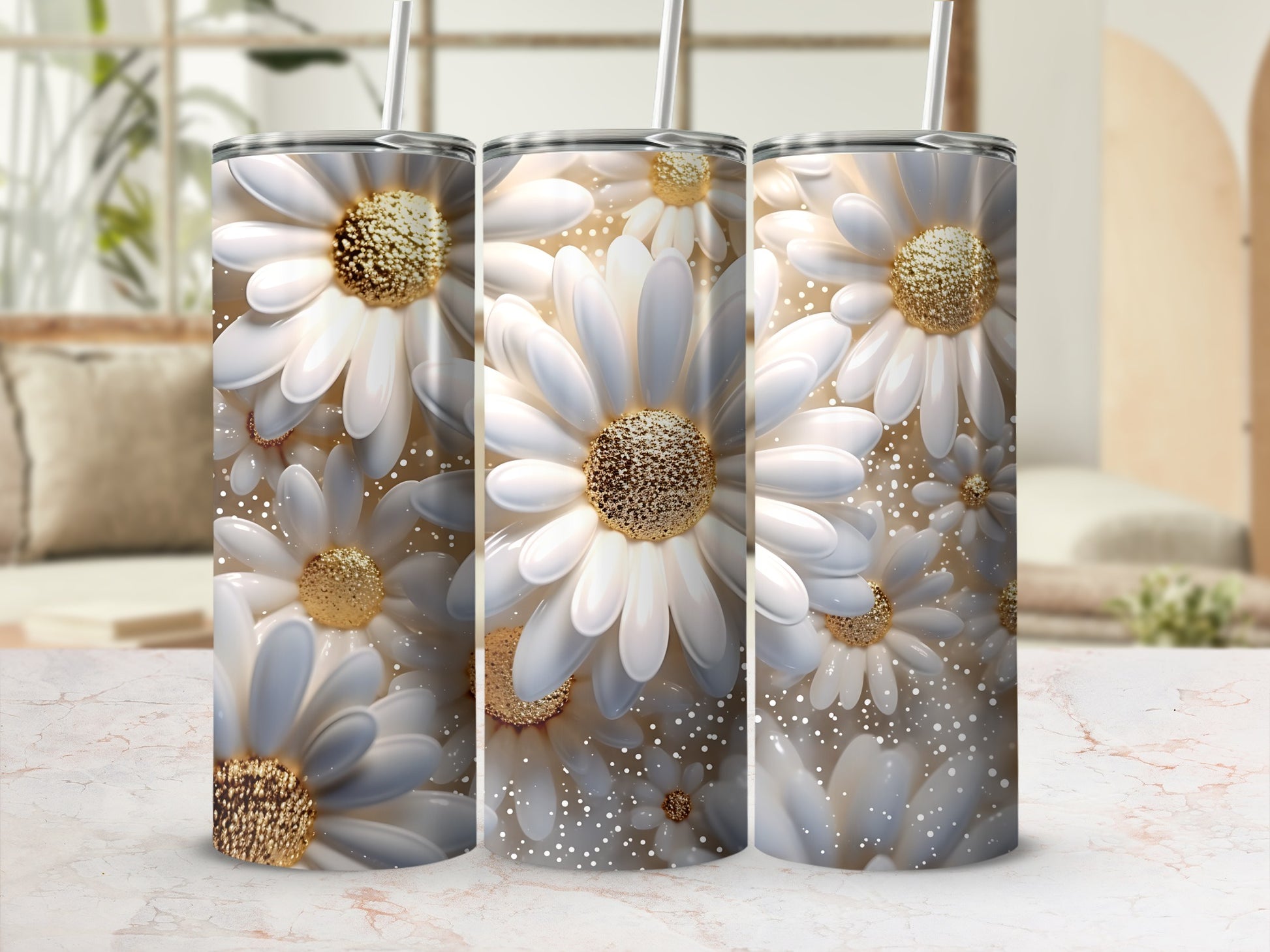 White daisy pattern on three stainless steel tumblers with straws.