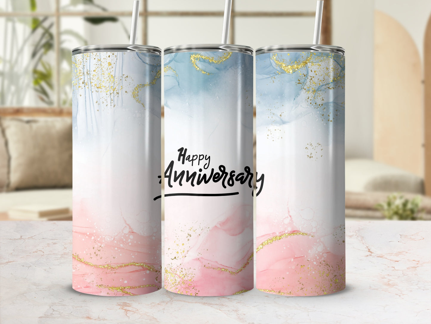 Three tumblers with marbled pink, blue, and gold design and "Happy Anniversary" text.