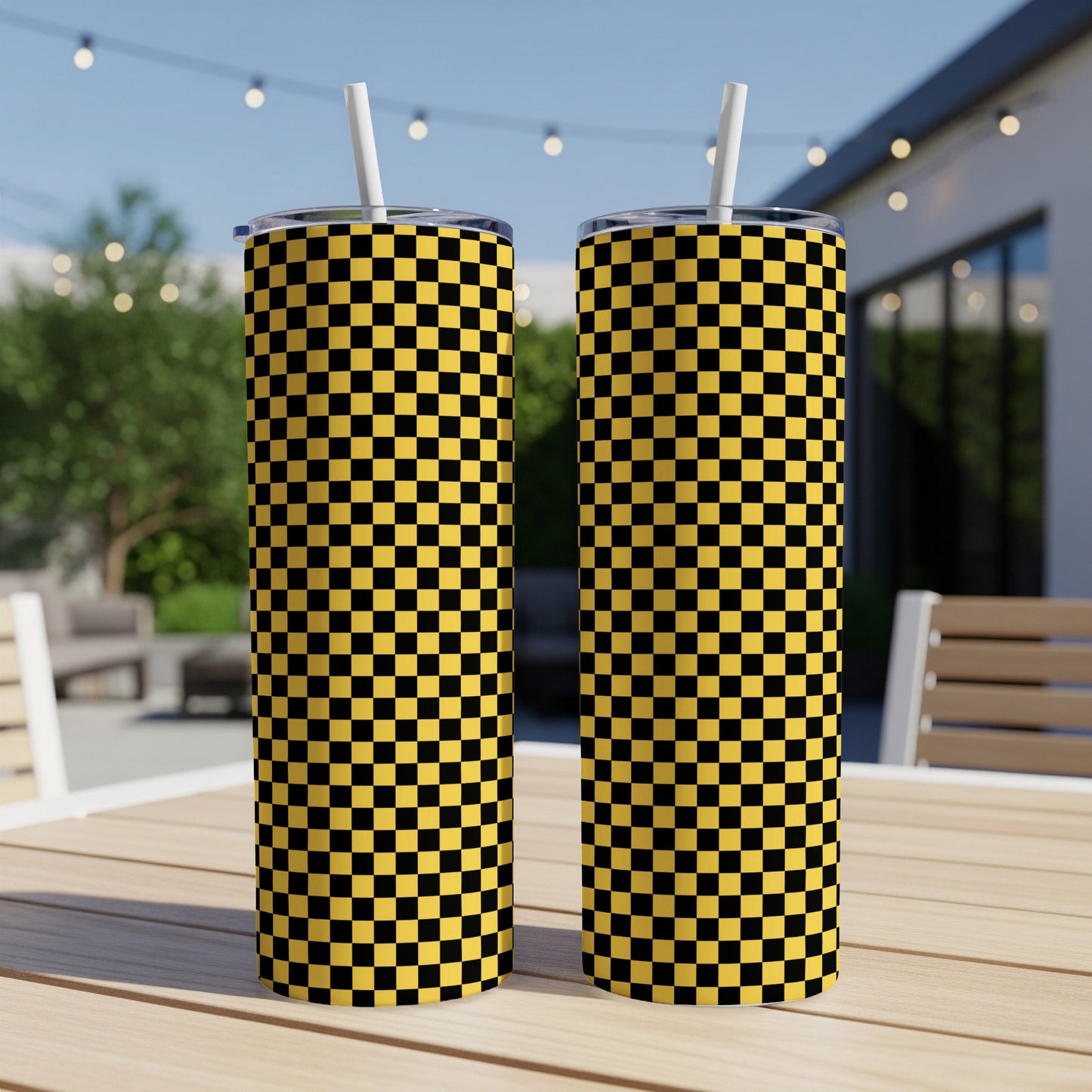 Two tall tumblers with a black and yellow checkerboard pattern.