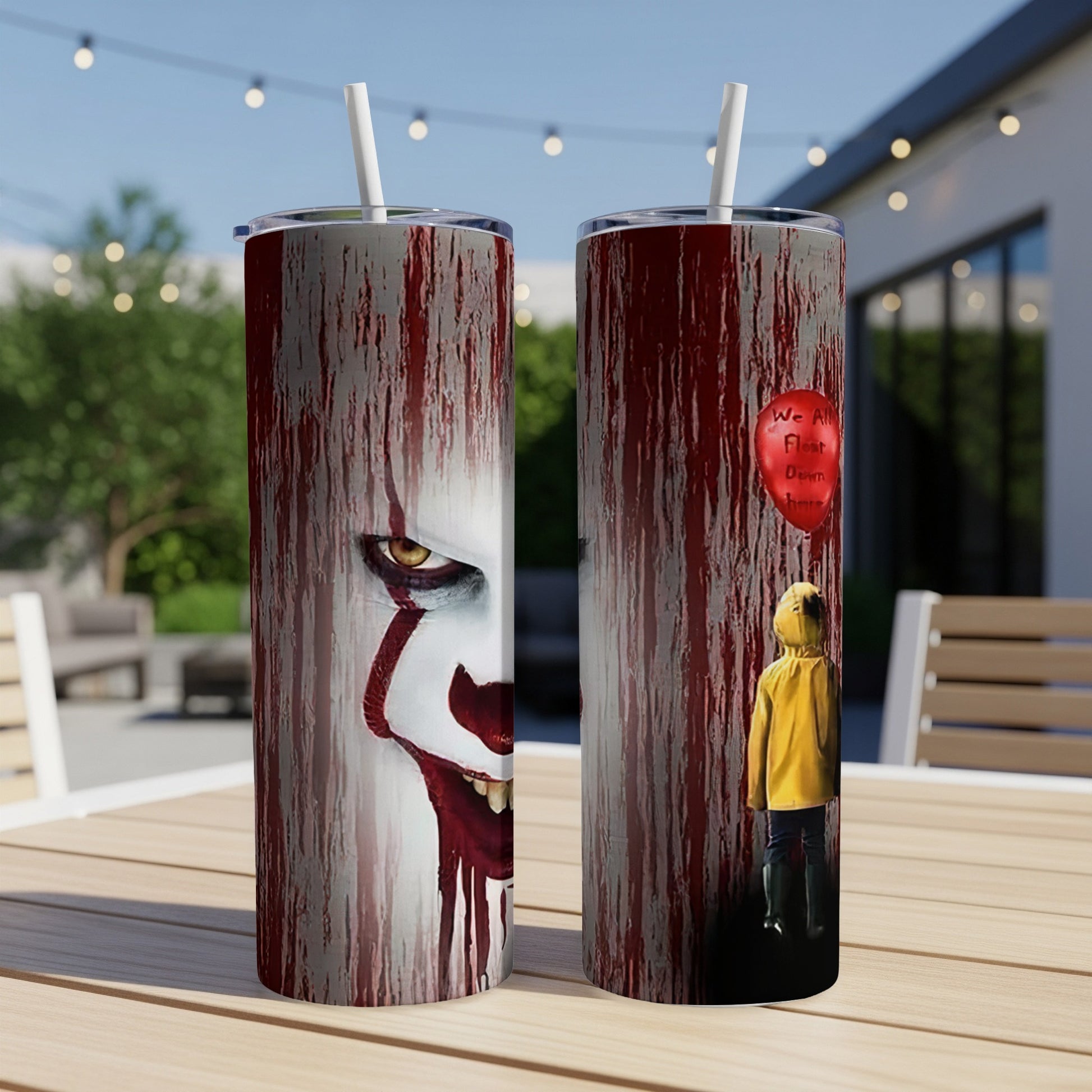 Two tumblers display Pennywise the clown and Georgie with a red balloon.
