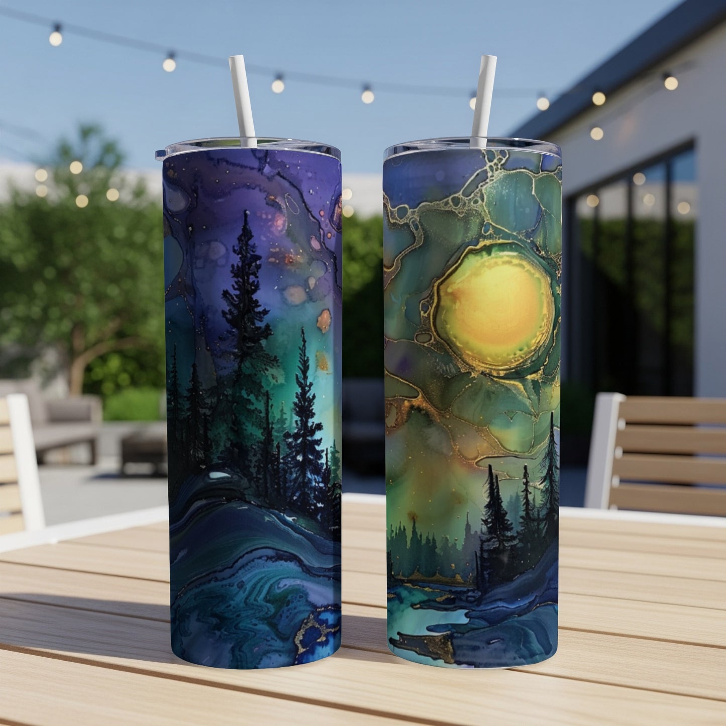 Two tumblers with abstract forest and moon designs.